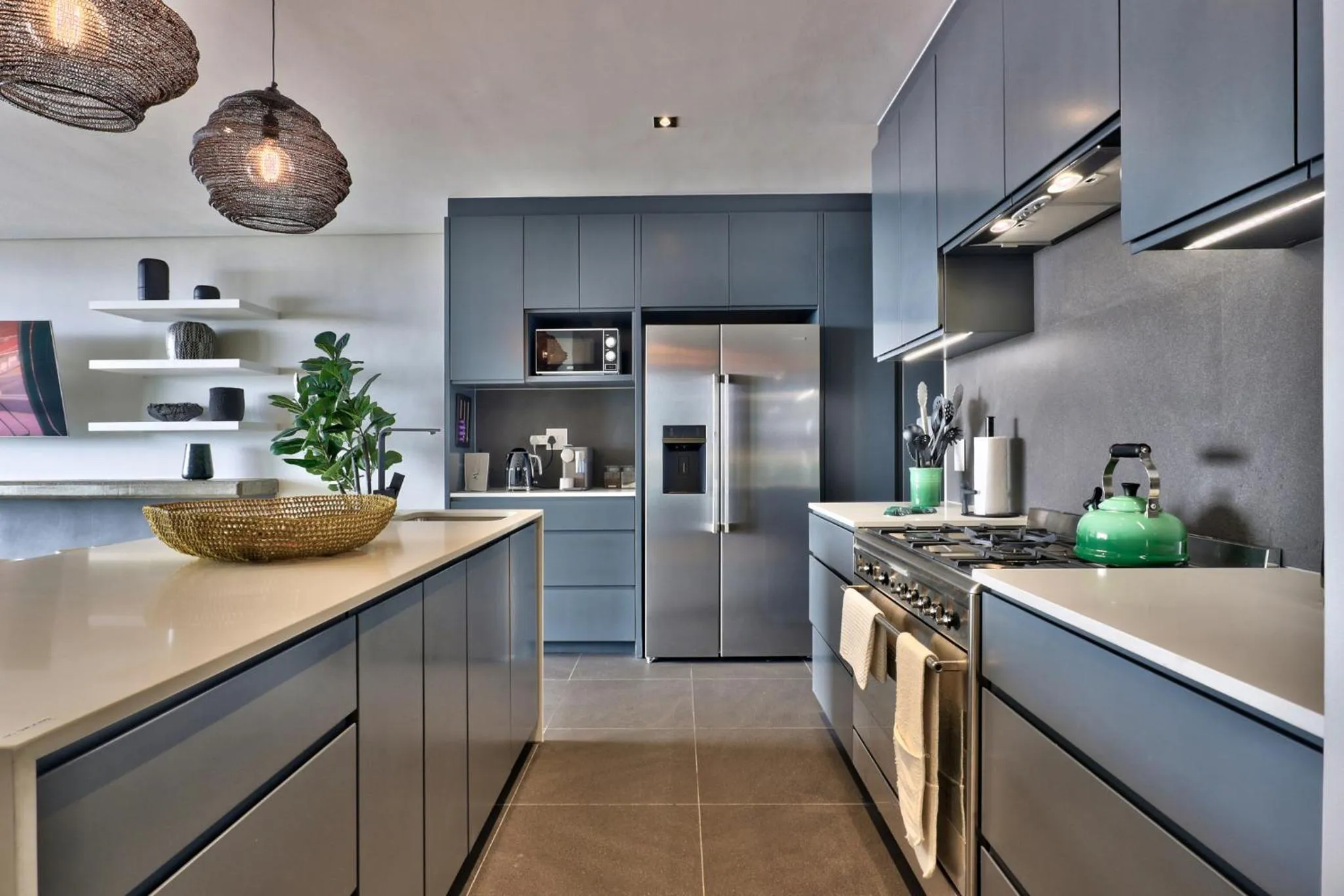 kitchen in Elements Luxury Suites by Totalstay