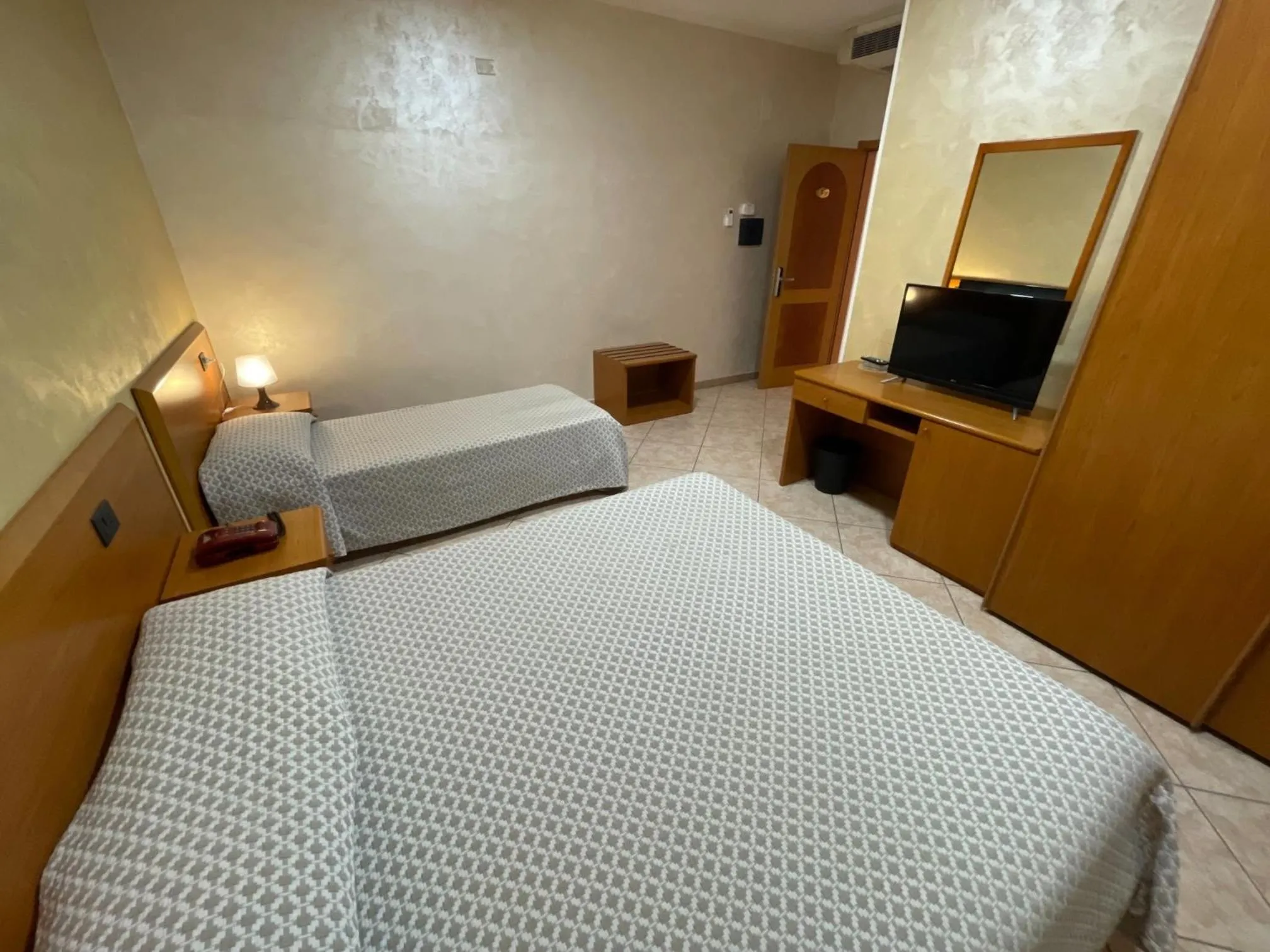 Bed in Hotel Toscano