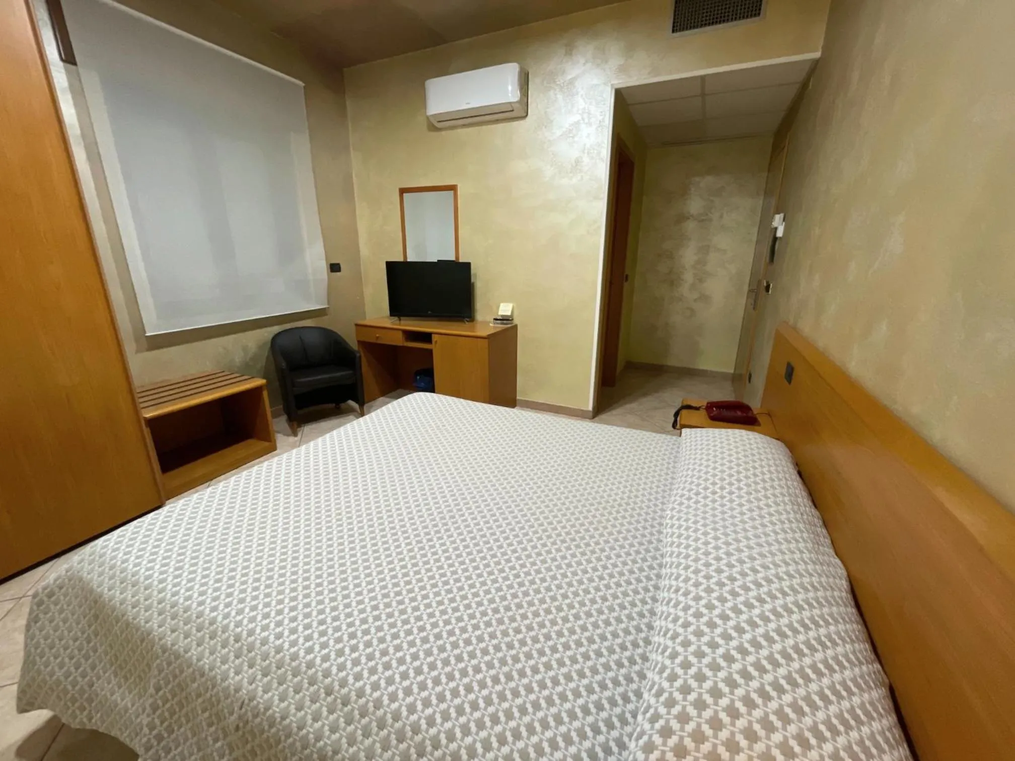 Bed in Hotel Toscano