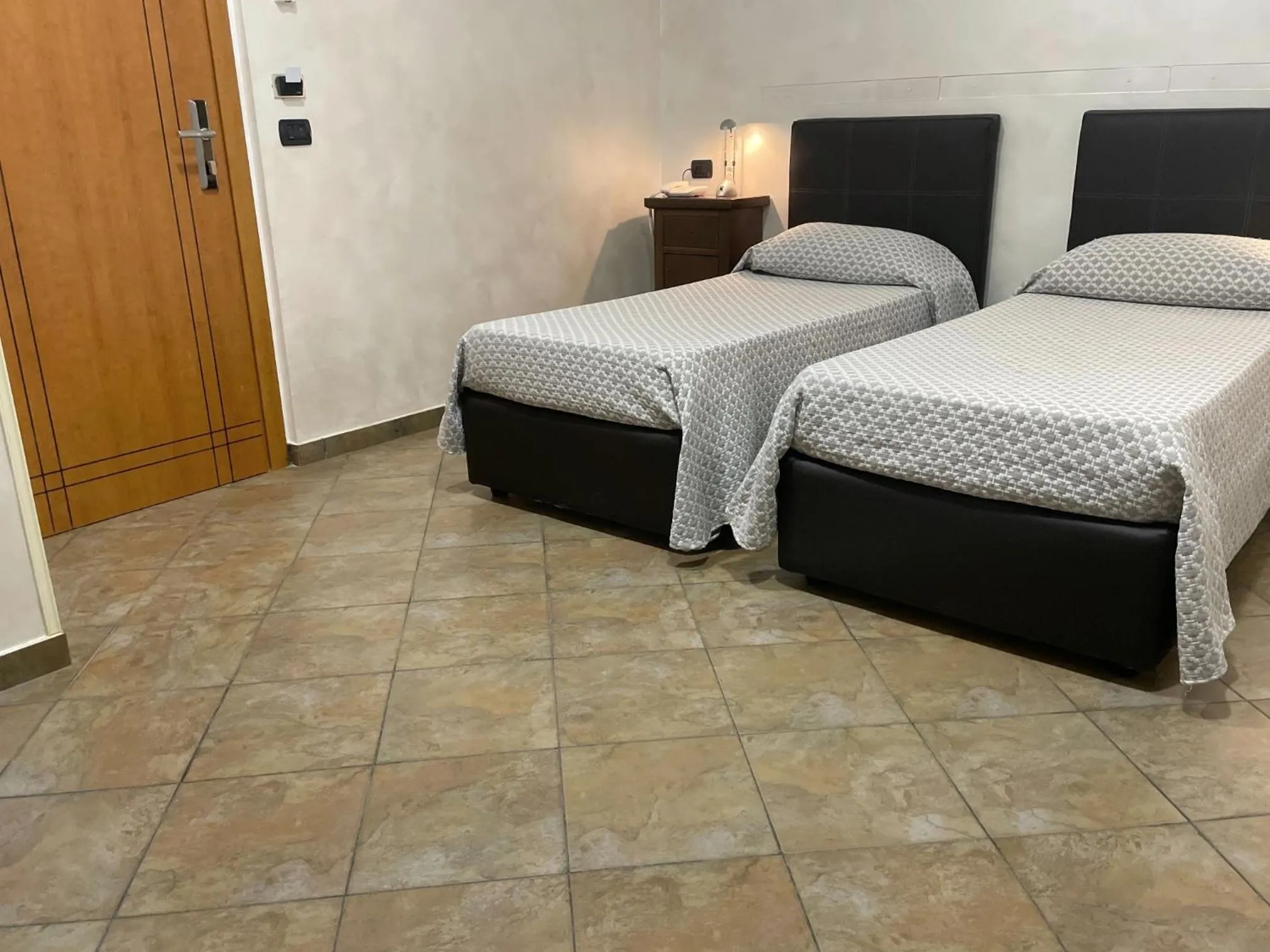 Bed in Hotel Toscano