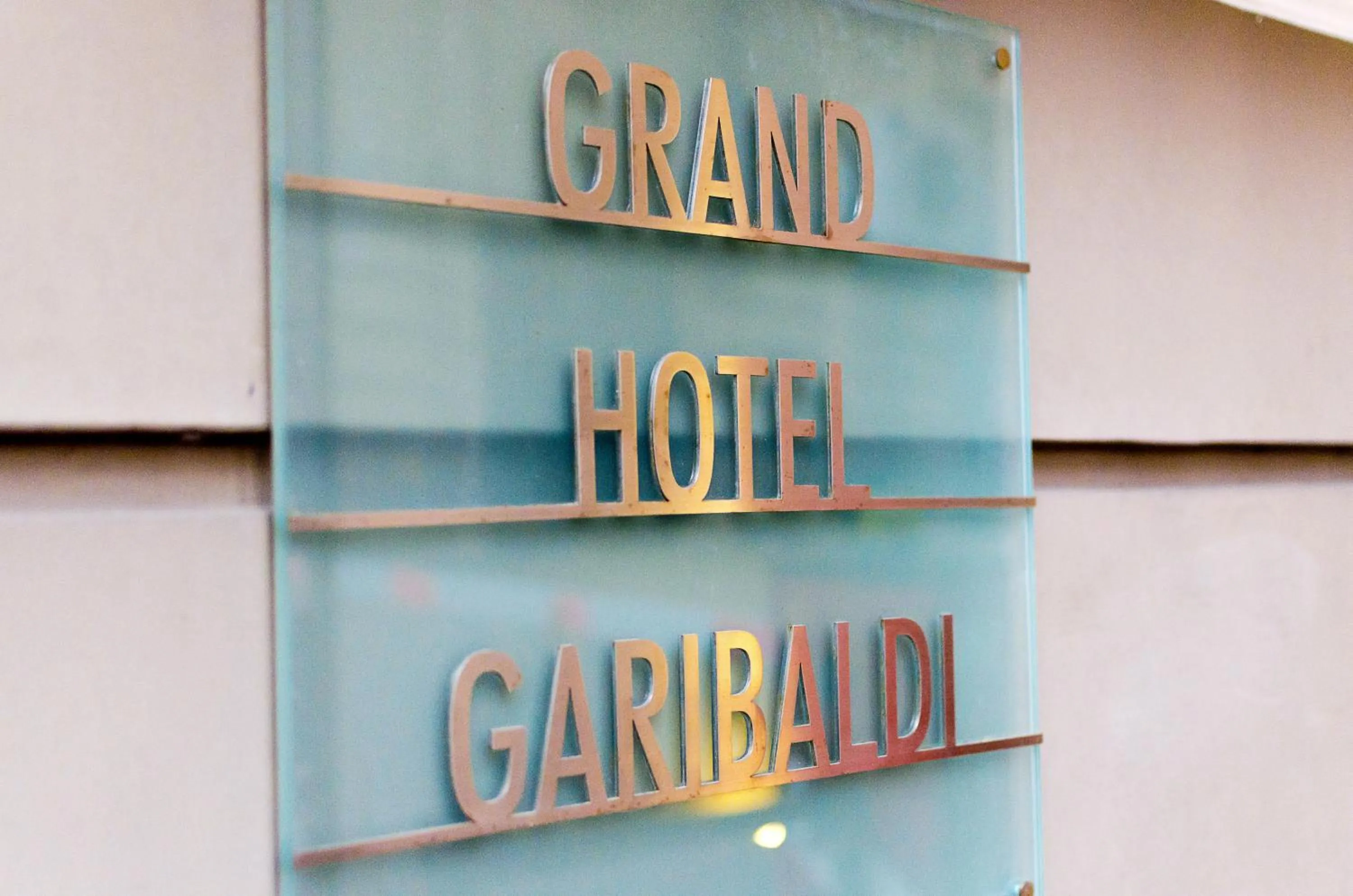 Property logo or sign in Hotel Garibaldi