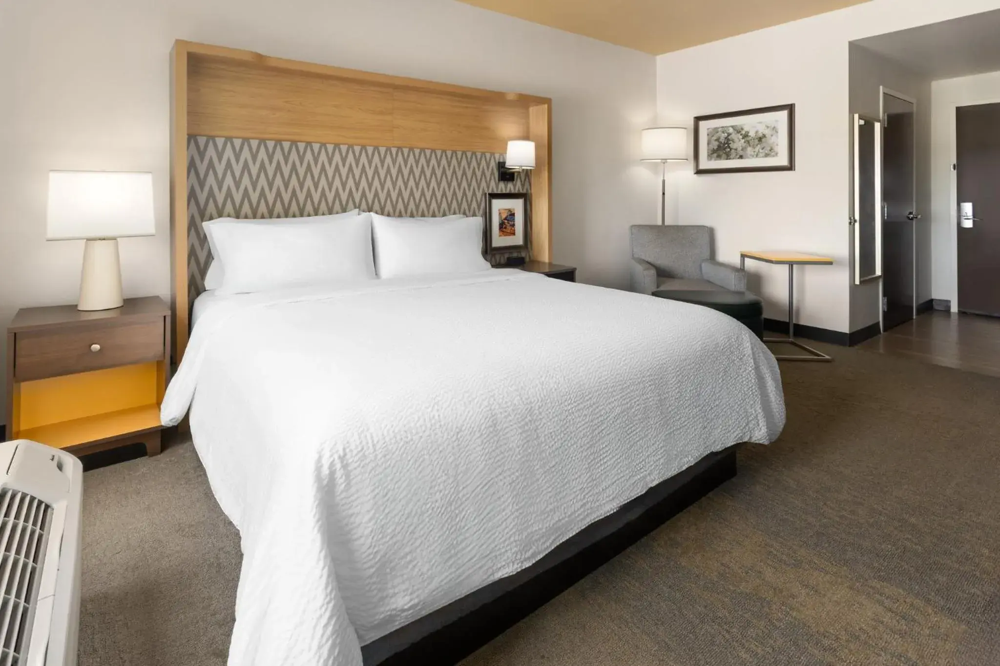 Photo of the whole room, Bed in Holiday Inn & Suites - Savannah Airport - Pooler by IHG Photo of the whole room, Bed in Holiday Inn & Suites - Savannah Airport - Pooler by IHG