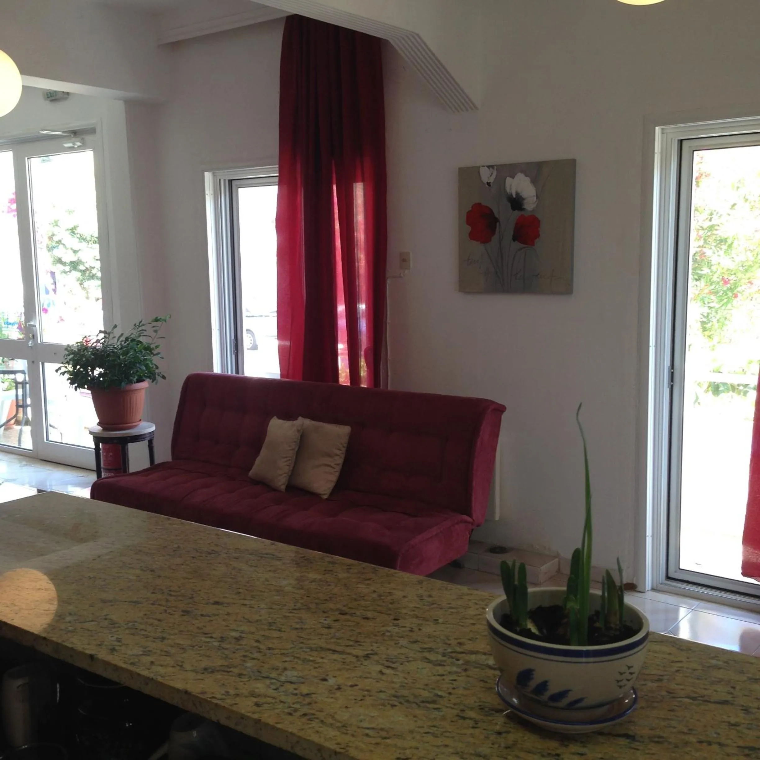 Communal lounge/ TV room in Zefyros Hotel