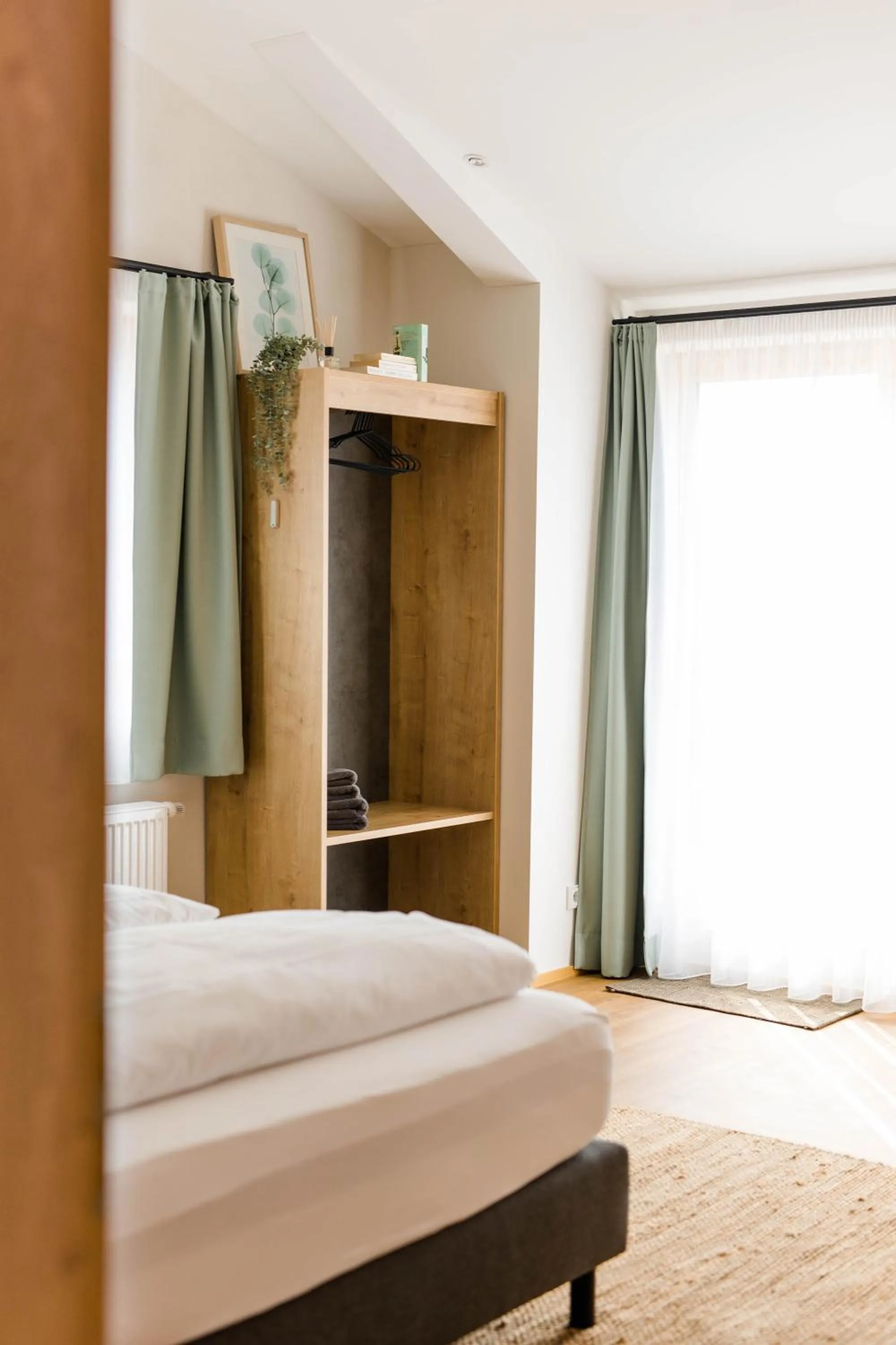 Photo of the whole room, Bed in Stadthotel Freilassing