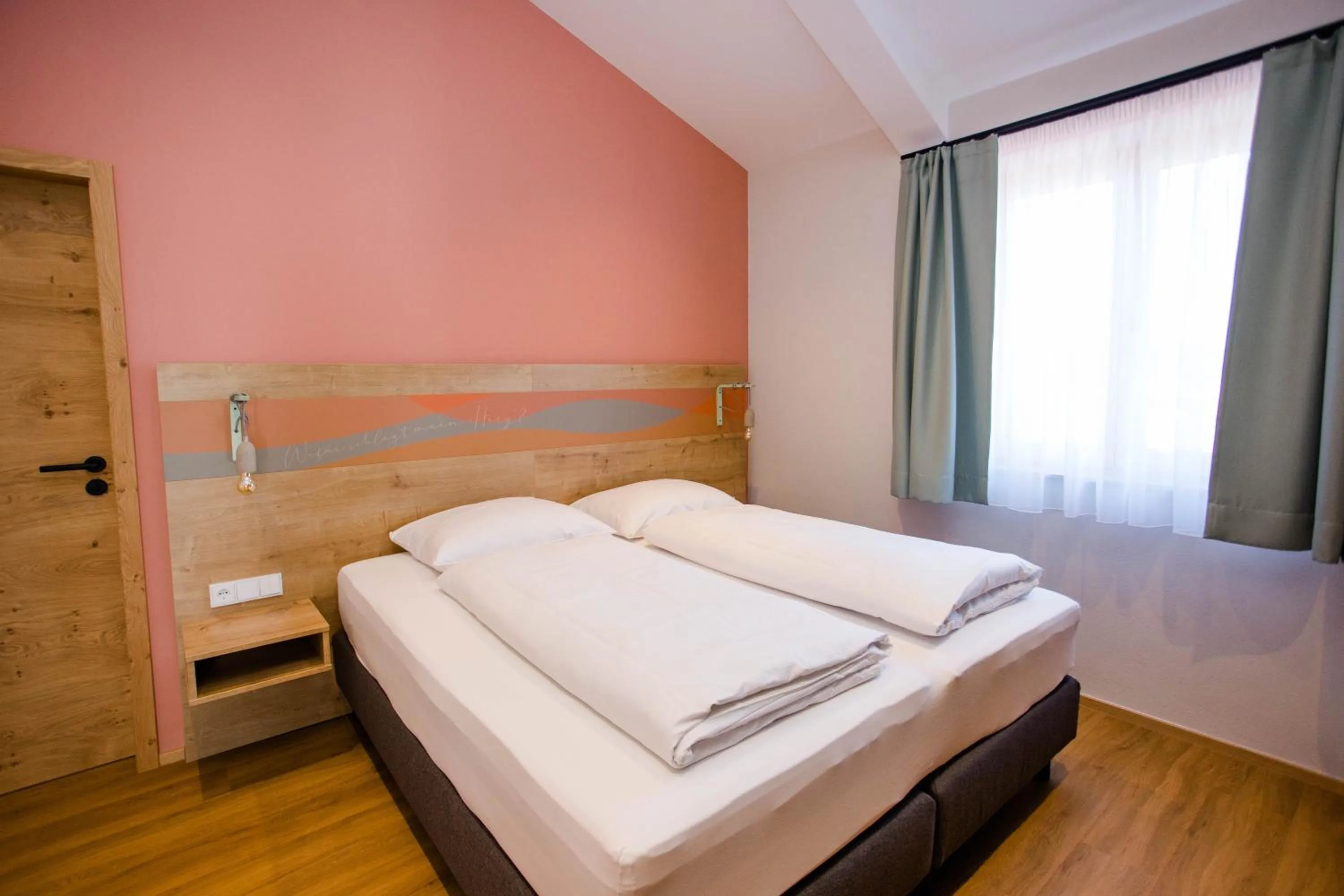 Bed in Stadthotel Freilassing