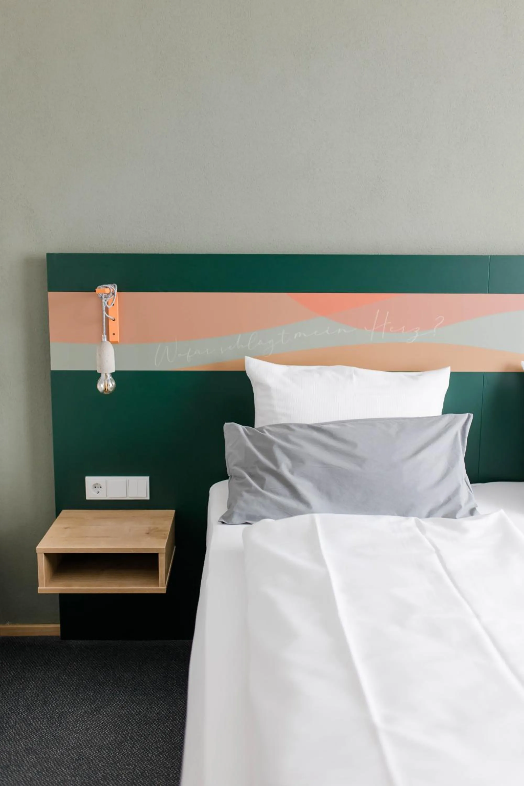 Bed in Stadthotel Freilassing