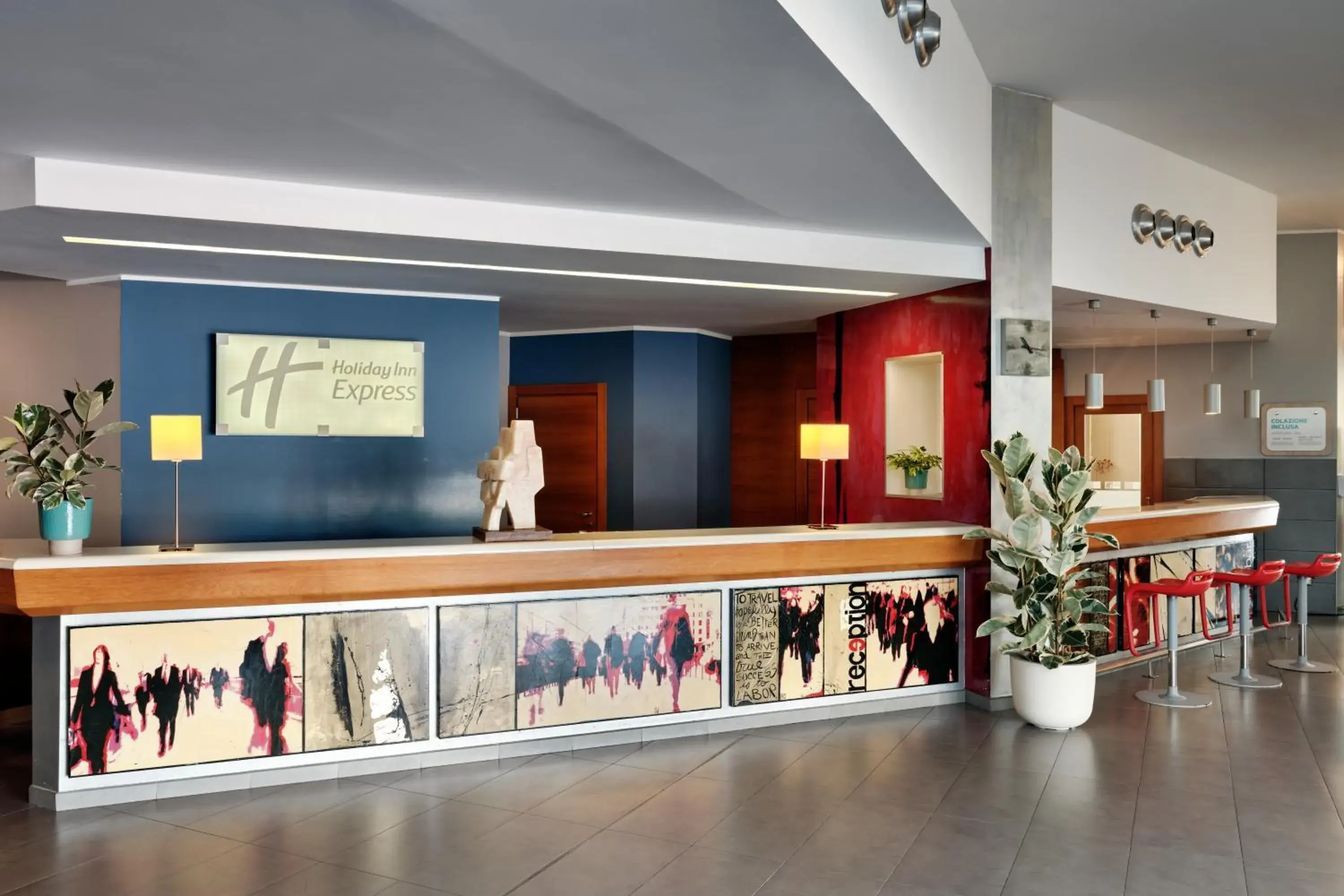 Lobby or reception in Holiday Inn Express Milan-Malpensa Airport by IHG Lobby or reception in Holiday Inn Express Milan-Malpensa Airport by IHG