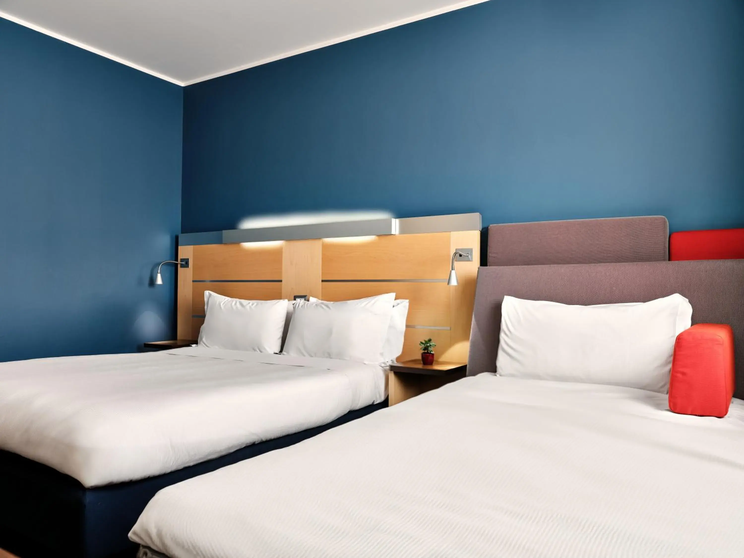 Bed in Holiday Inn Express Milan-Malpensa Airport by IHG Bed in Holiday Inn Express Milan-Malpensa Airport by IHG