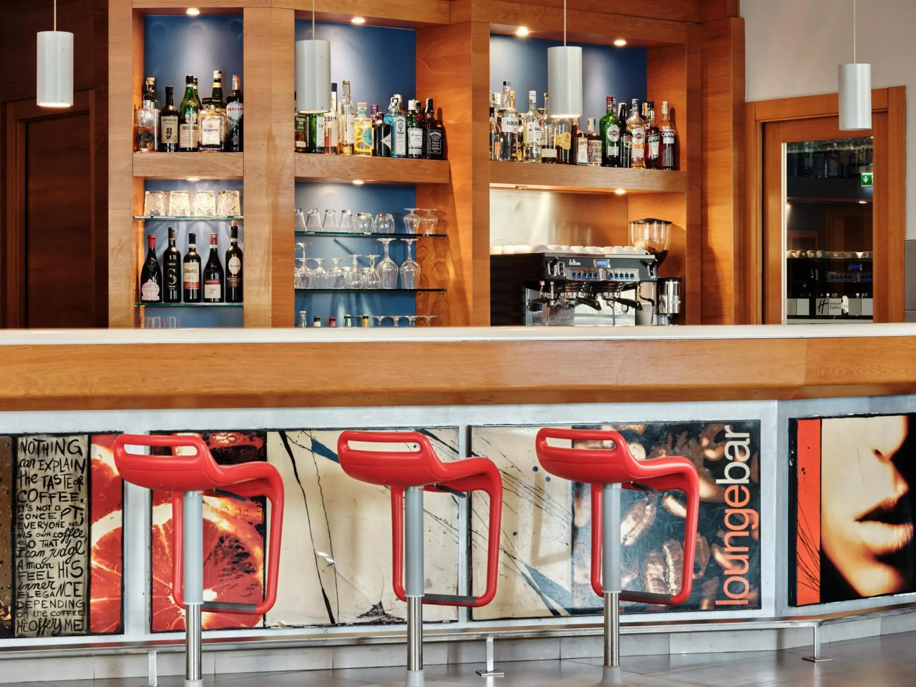 Lounge or bar in Holiday Inn Express Milan-Malpensa Airport by IHG Lounge or bar in Holiday Inn Express Milan-Malpensa Airport by IHG