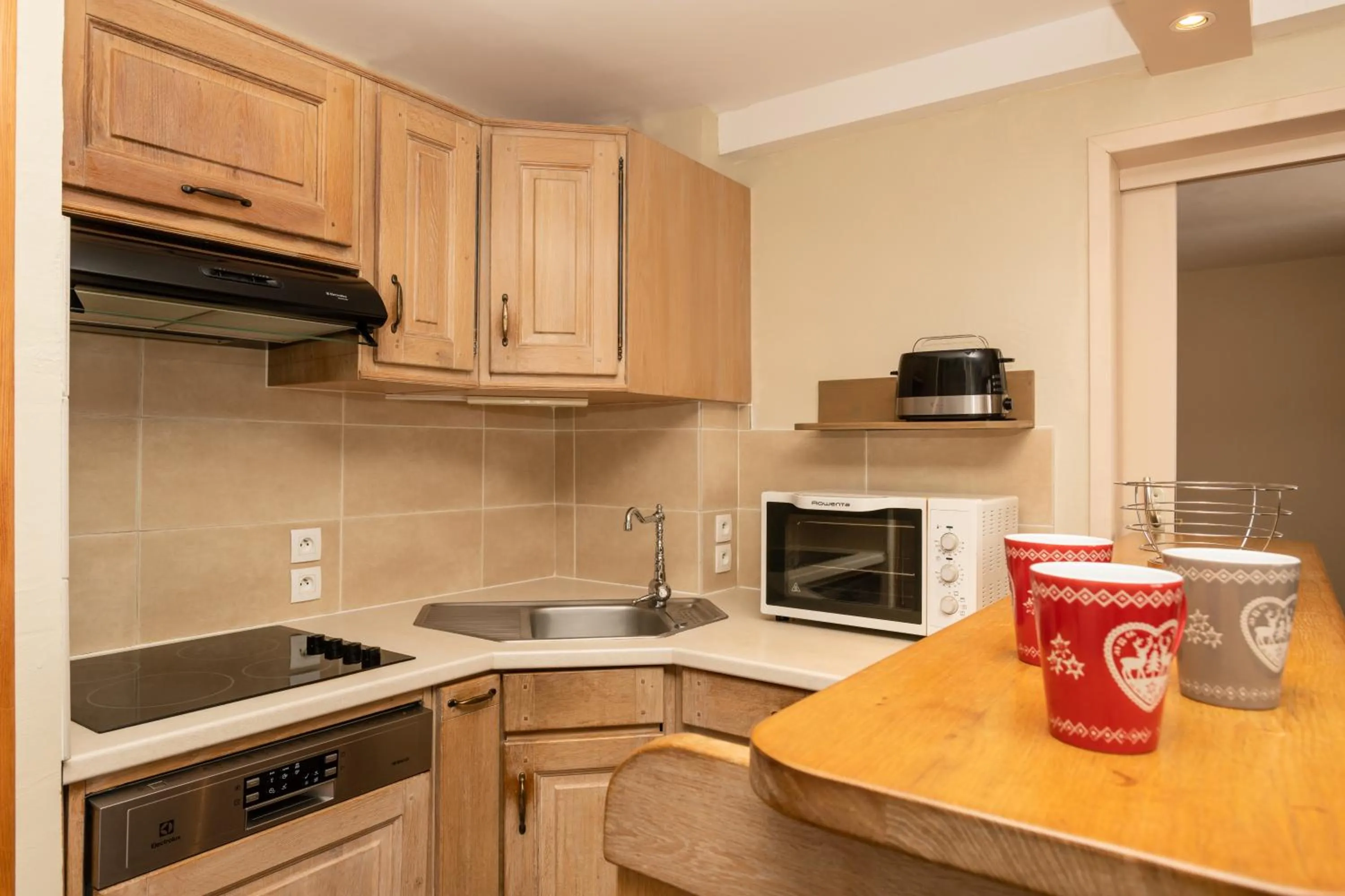 Kitchen or kitchenette in Résidence Le Chamois d'Or