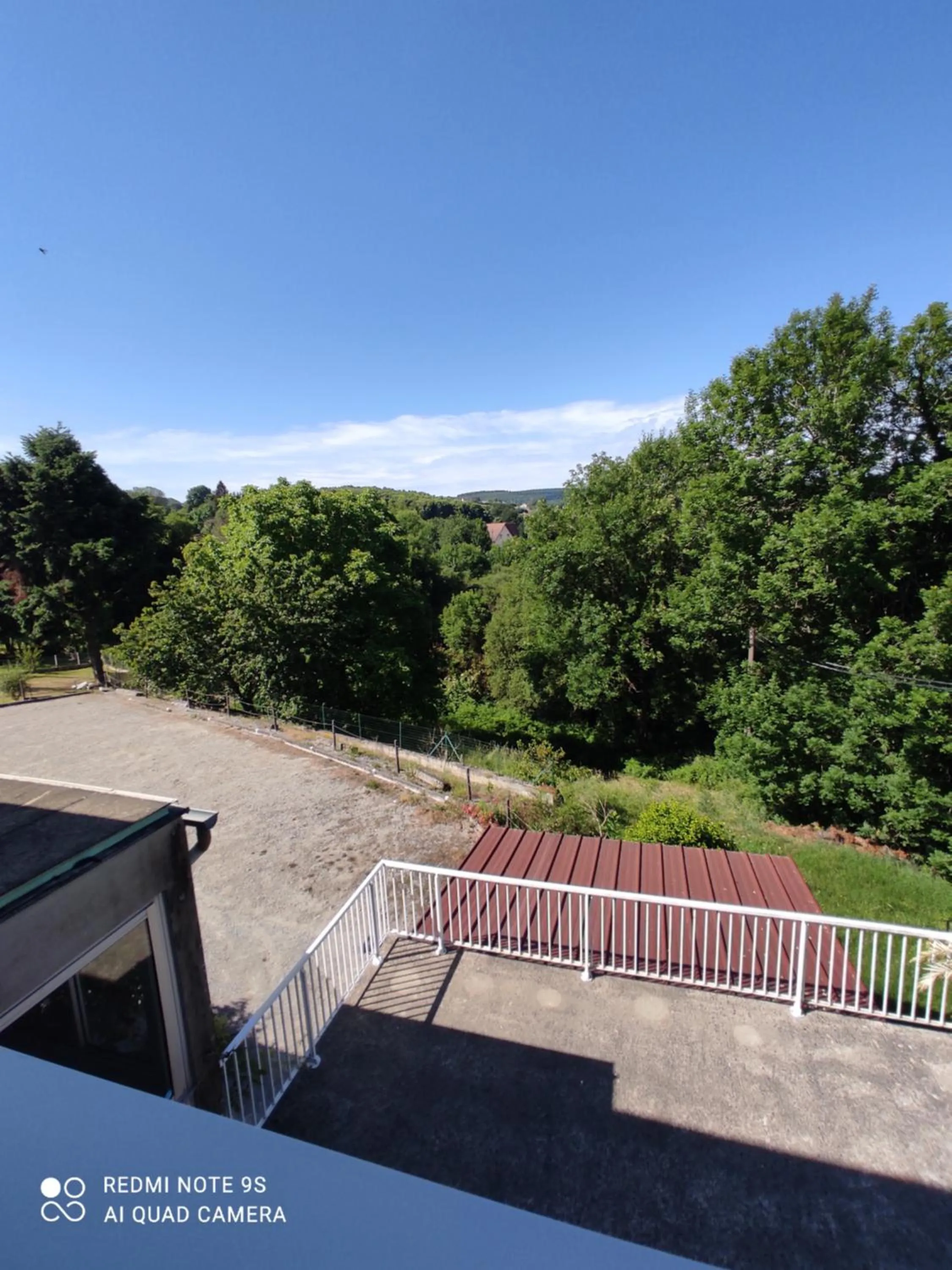 Garden view in Hôtel Le Pommeil