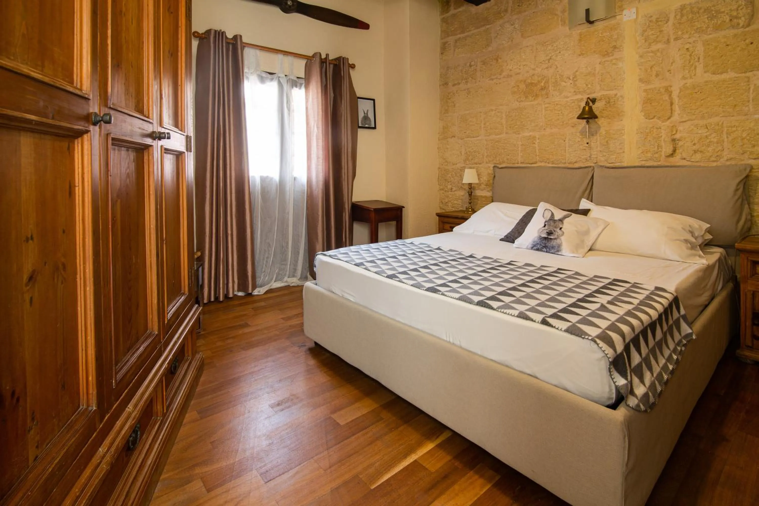 Bed in The Burrow Guest House