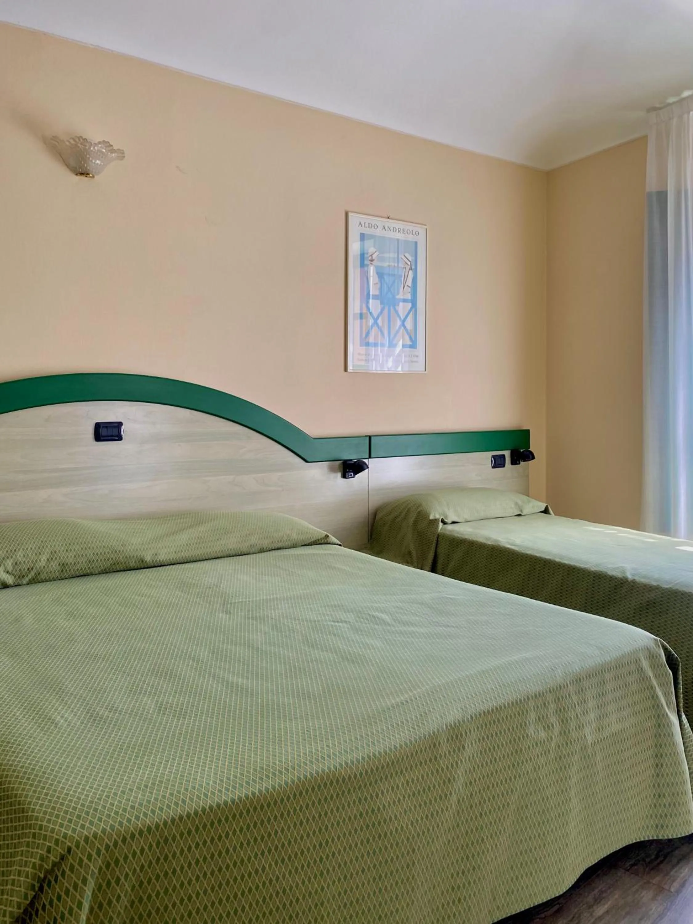 Bed in Hotel Rainero