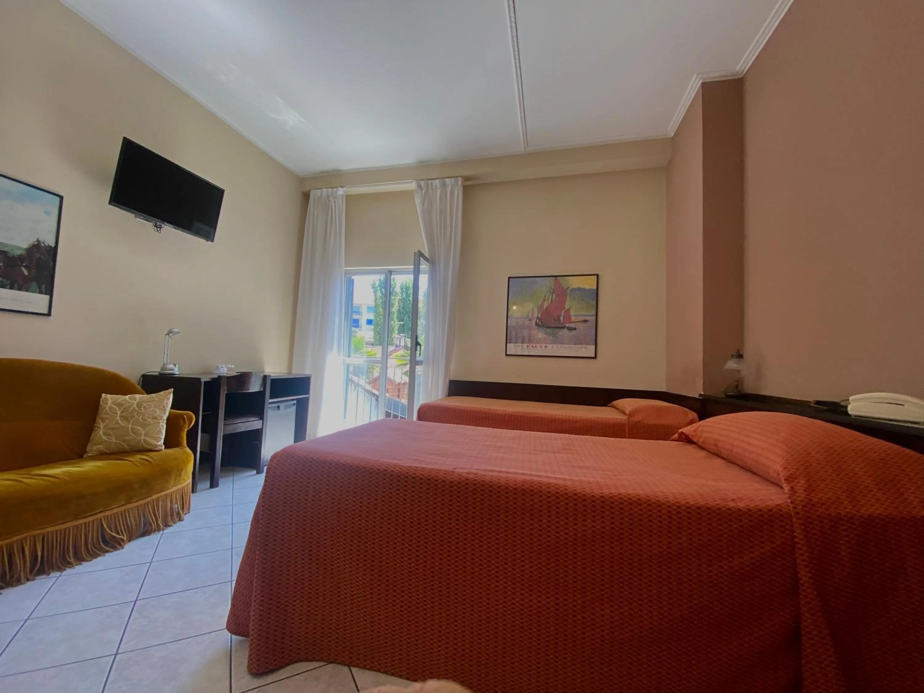 Bed in Hotel Rainero