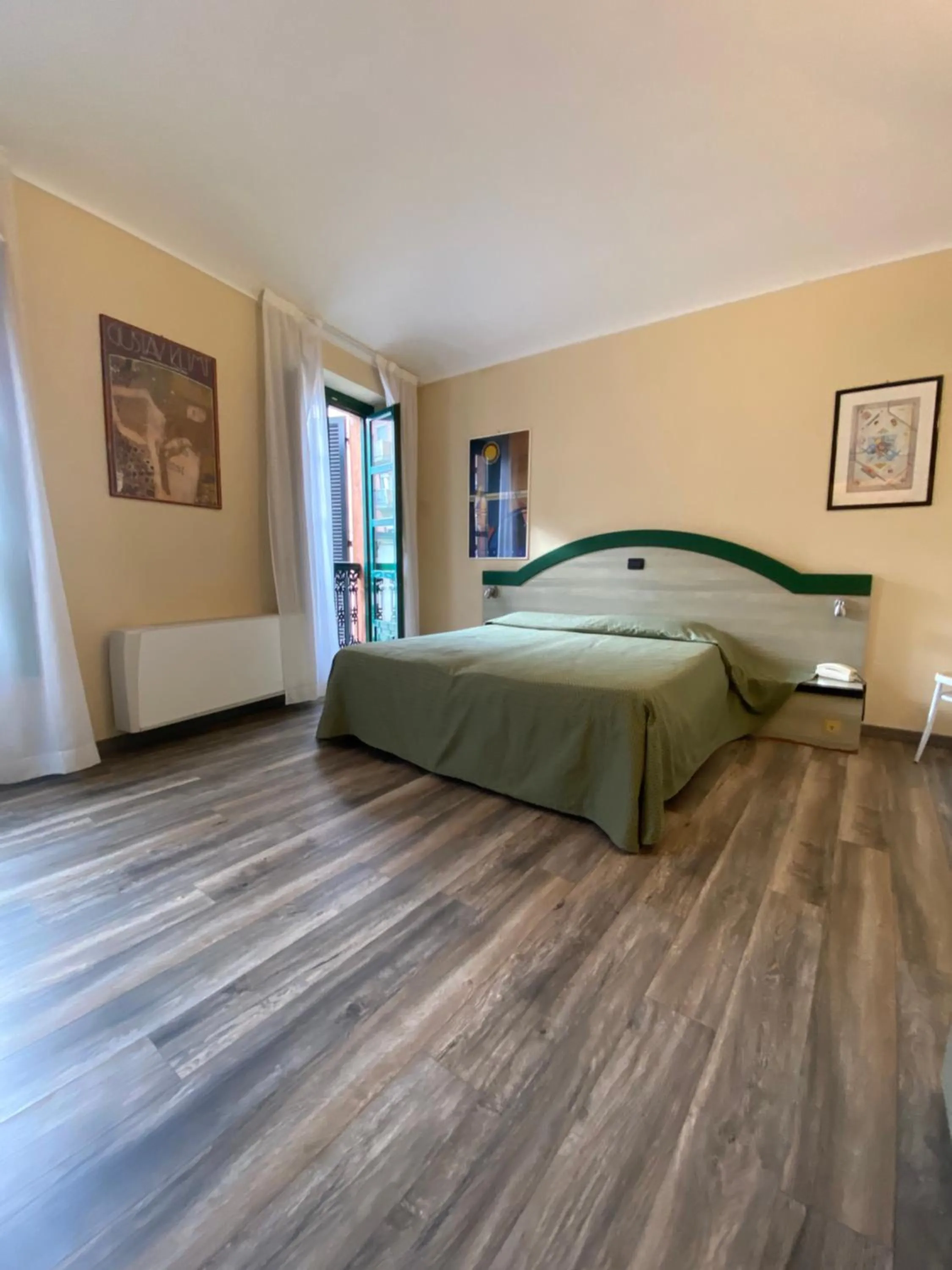 Bed in Hotel Rainero