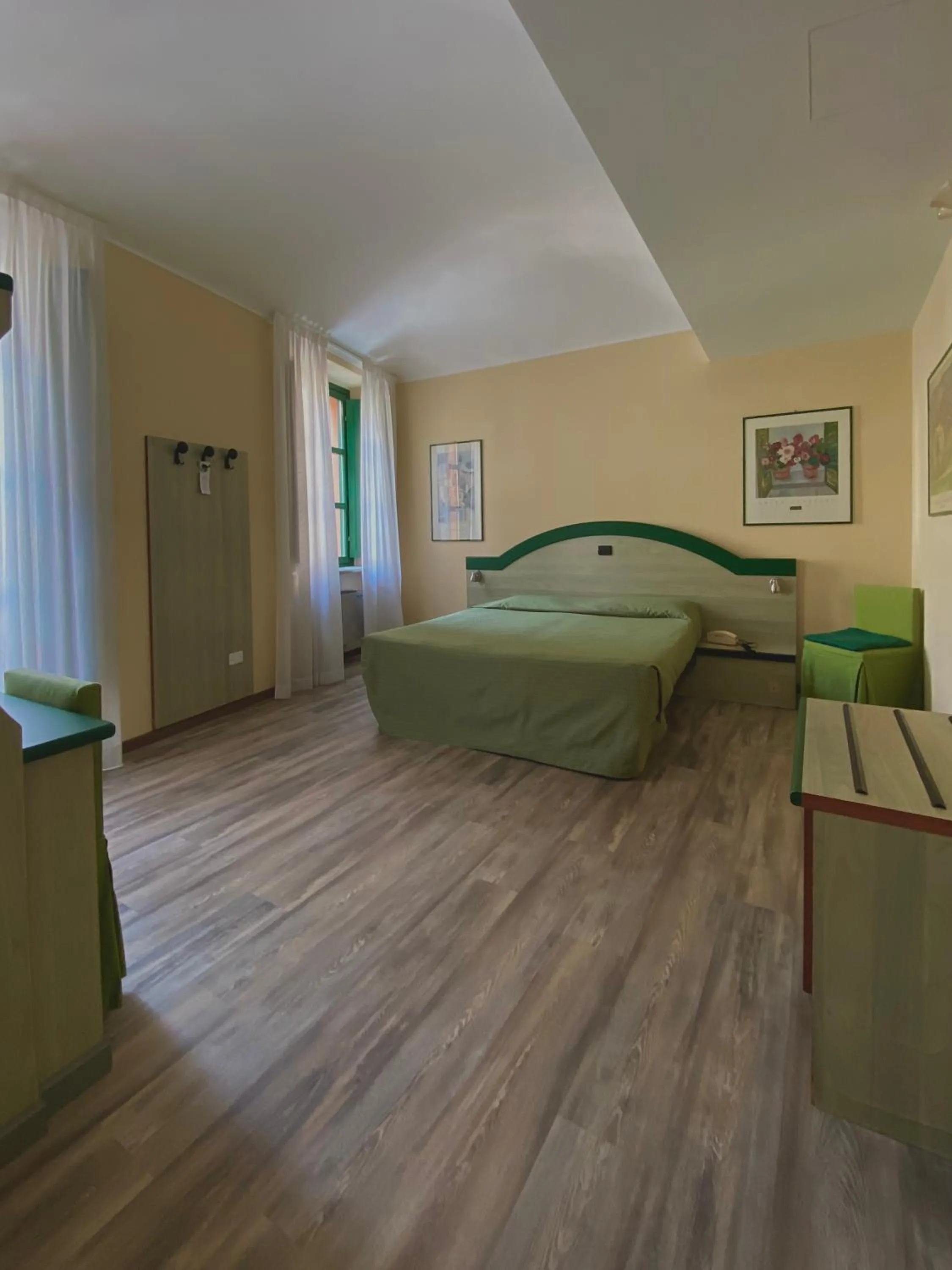 Bed in Hotel Rainero