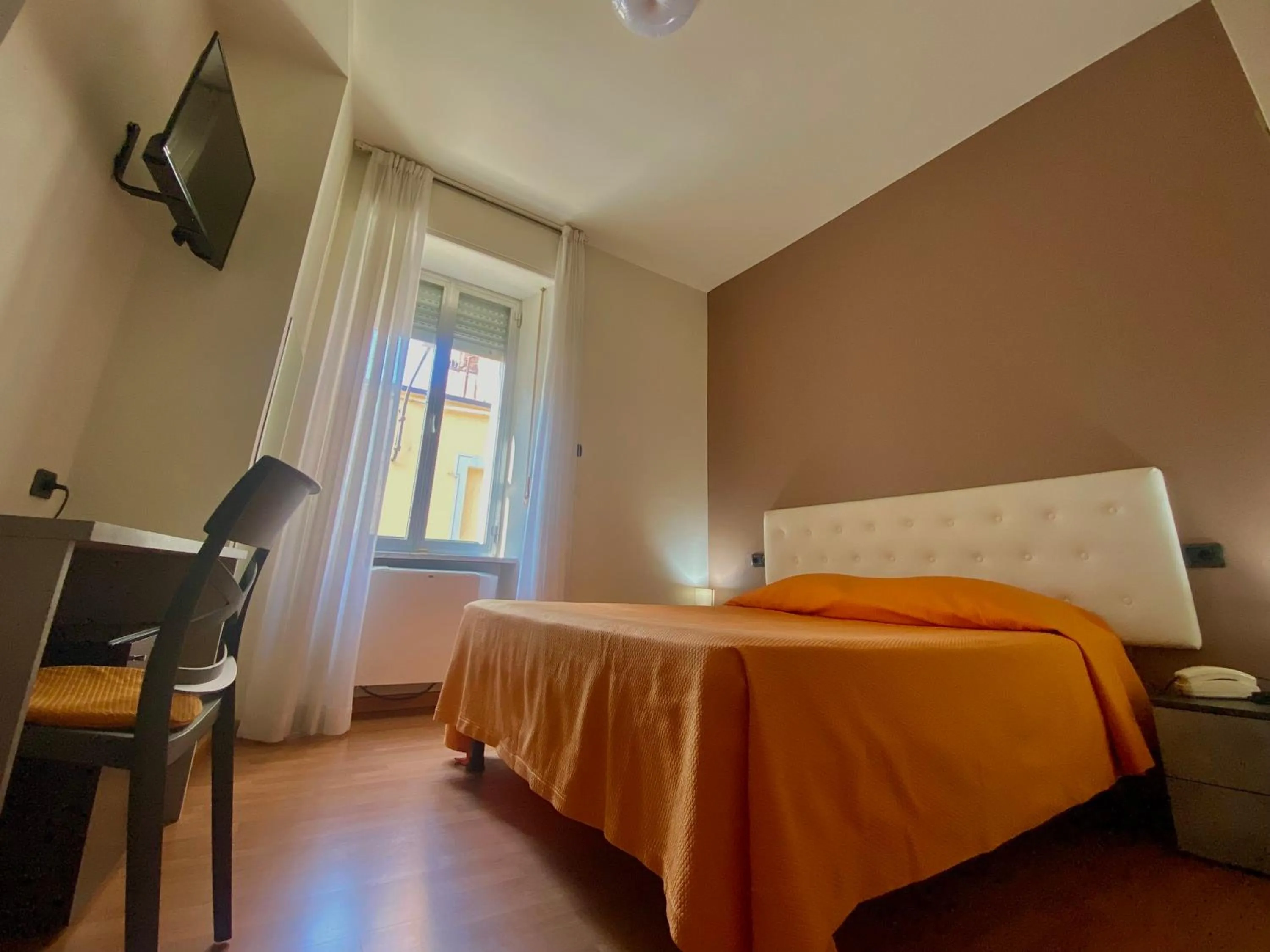 Bed in Hotel Rainero