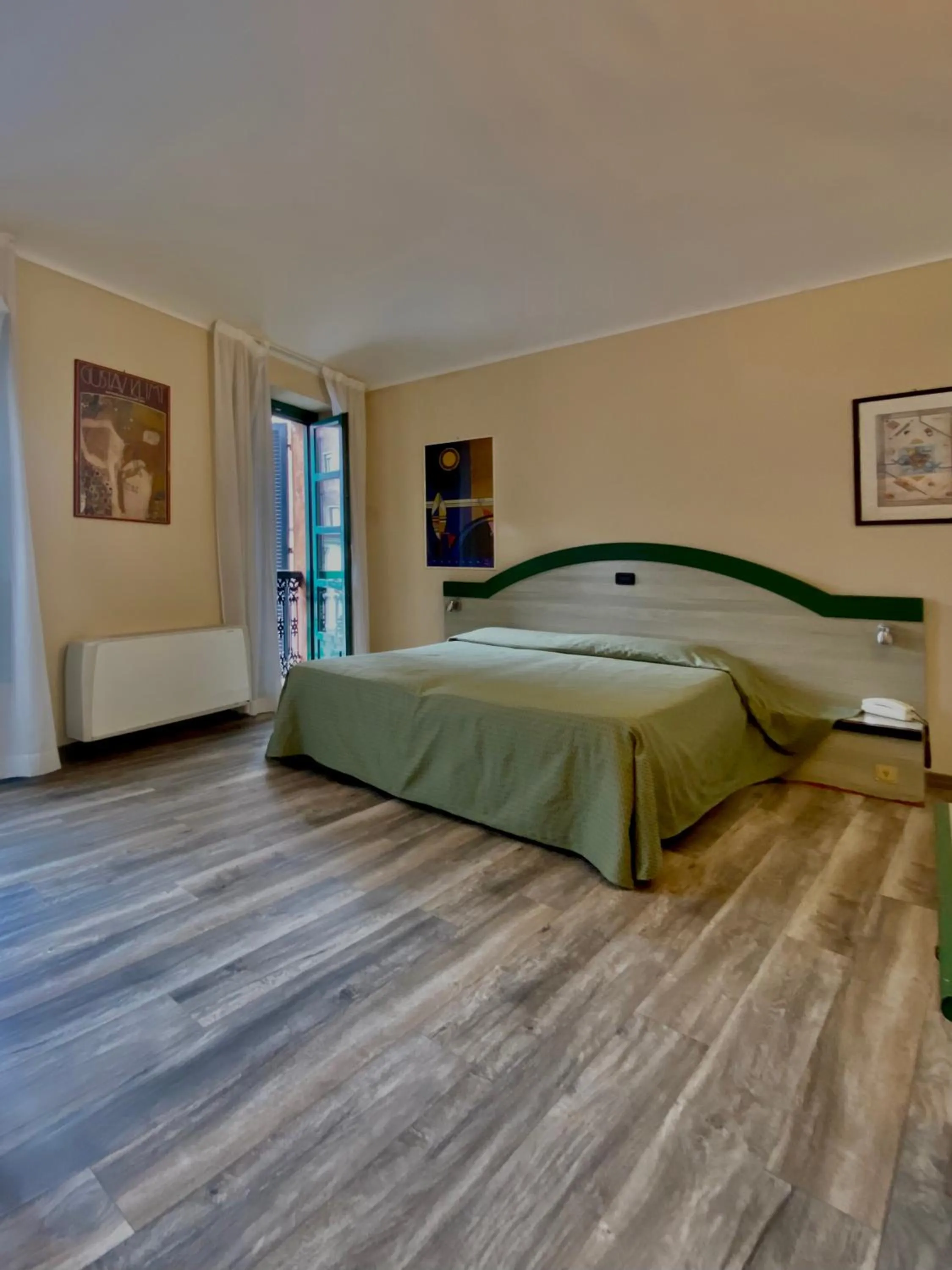 Bed in Hotel Rainero