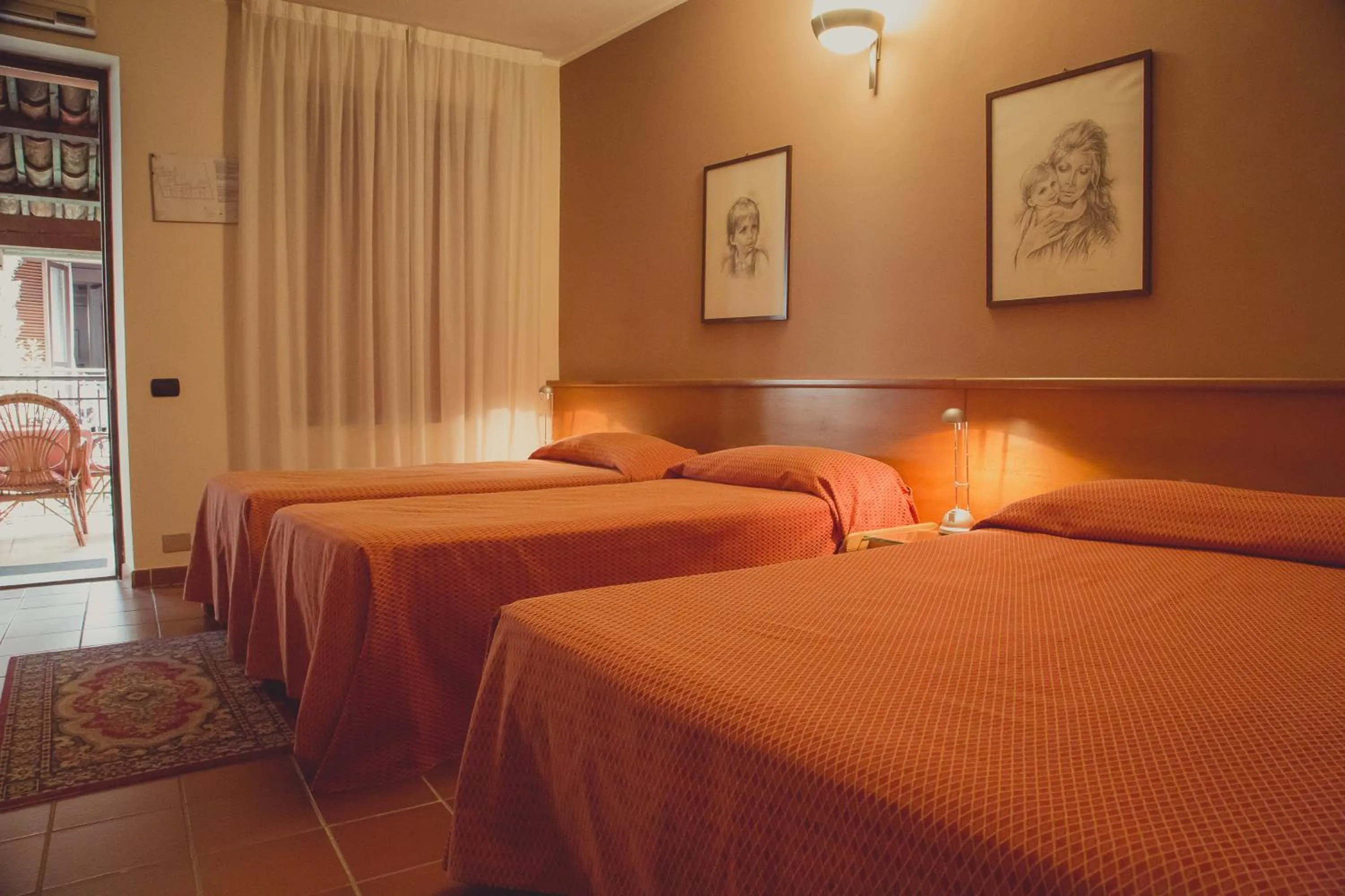 Bed in Hotel Rainero