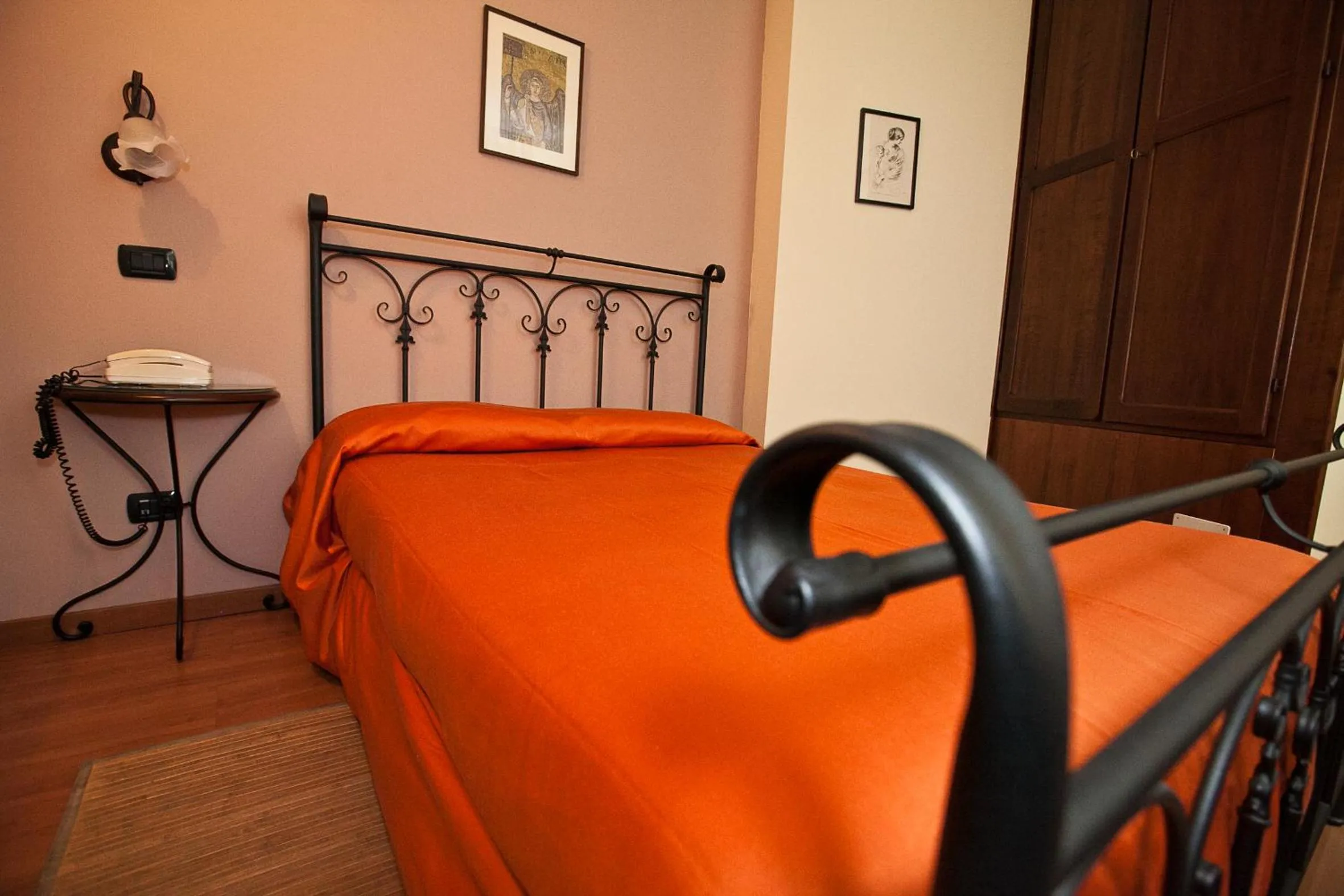 Bed in Hotel Rainero