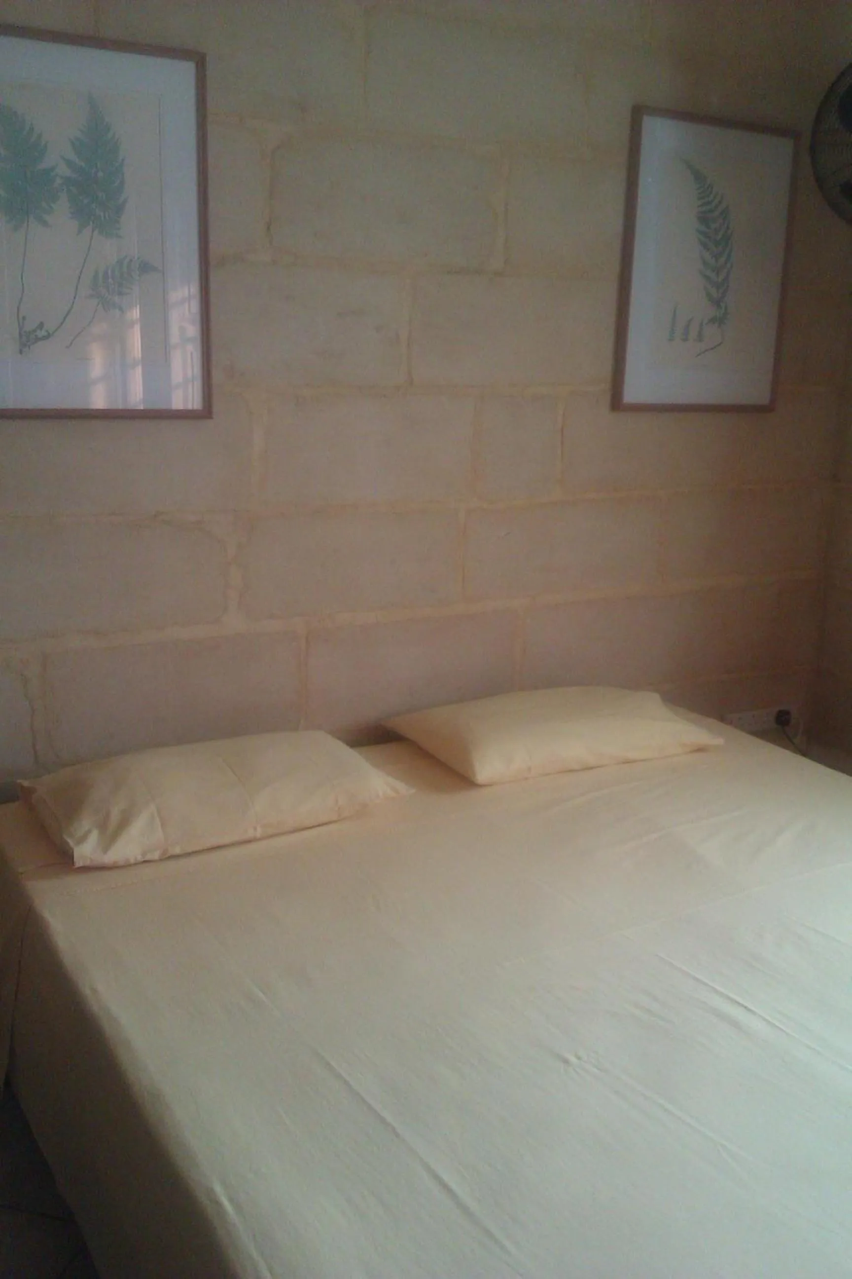 Bed in Ta' Bertu Host Family Bed & Breakfast