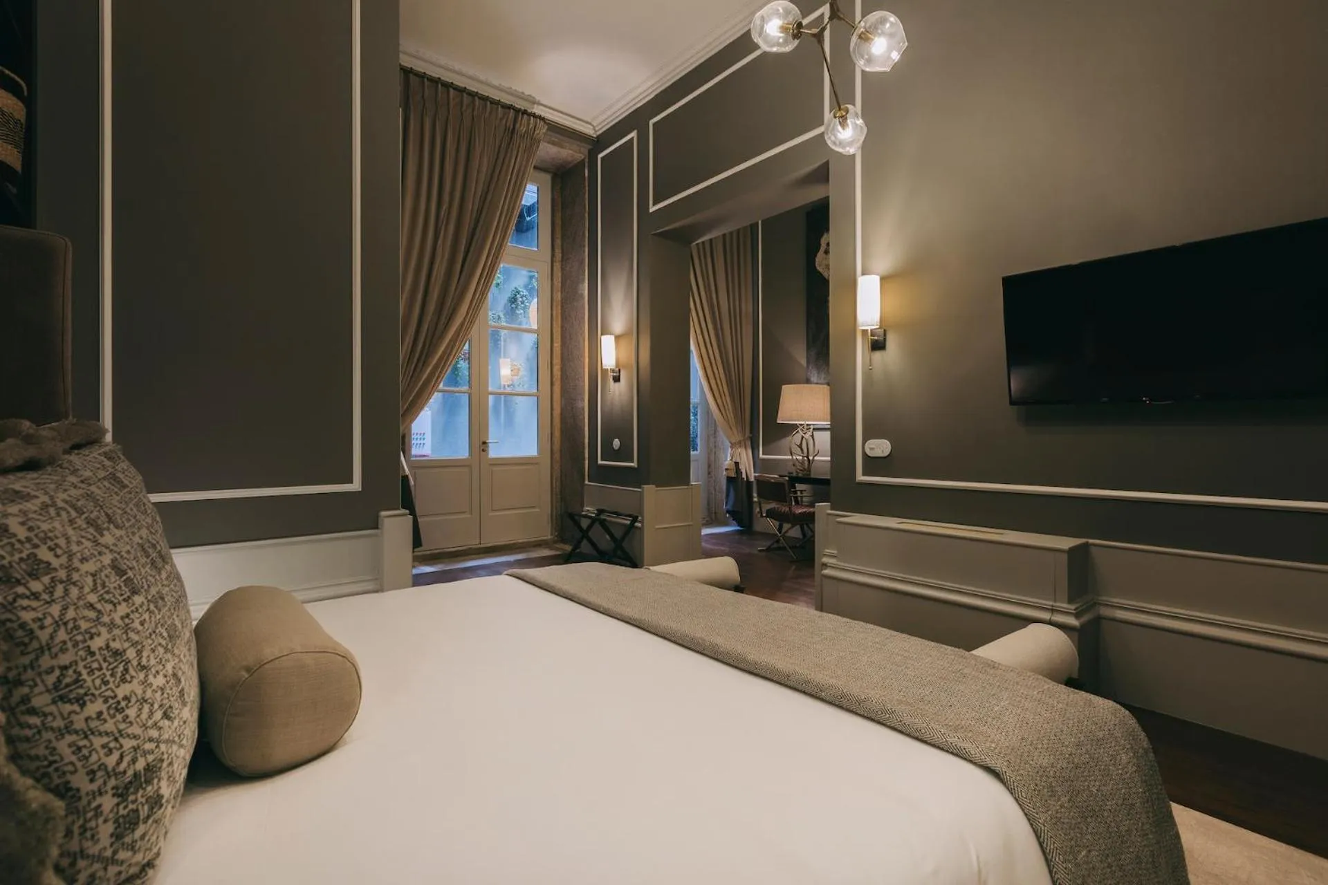 Bed in Torel 1884 Suites & Apartments