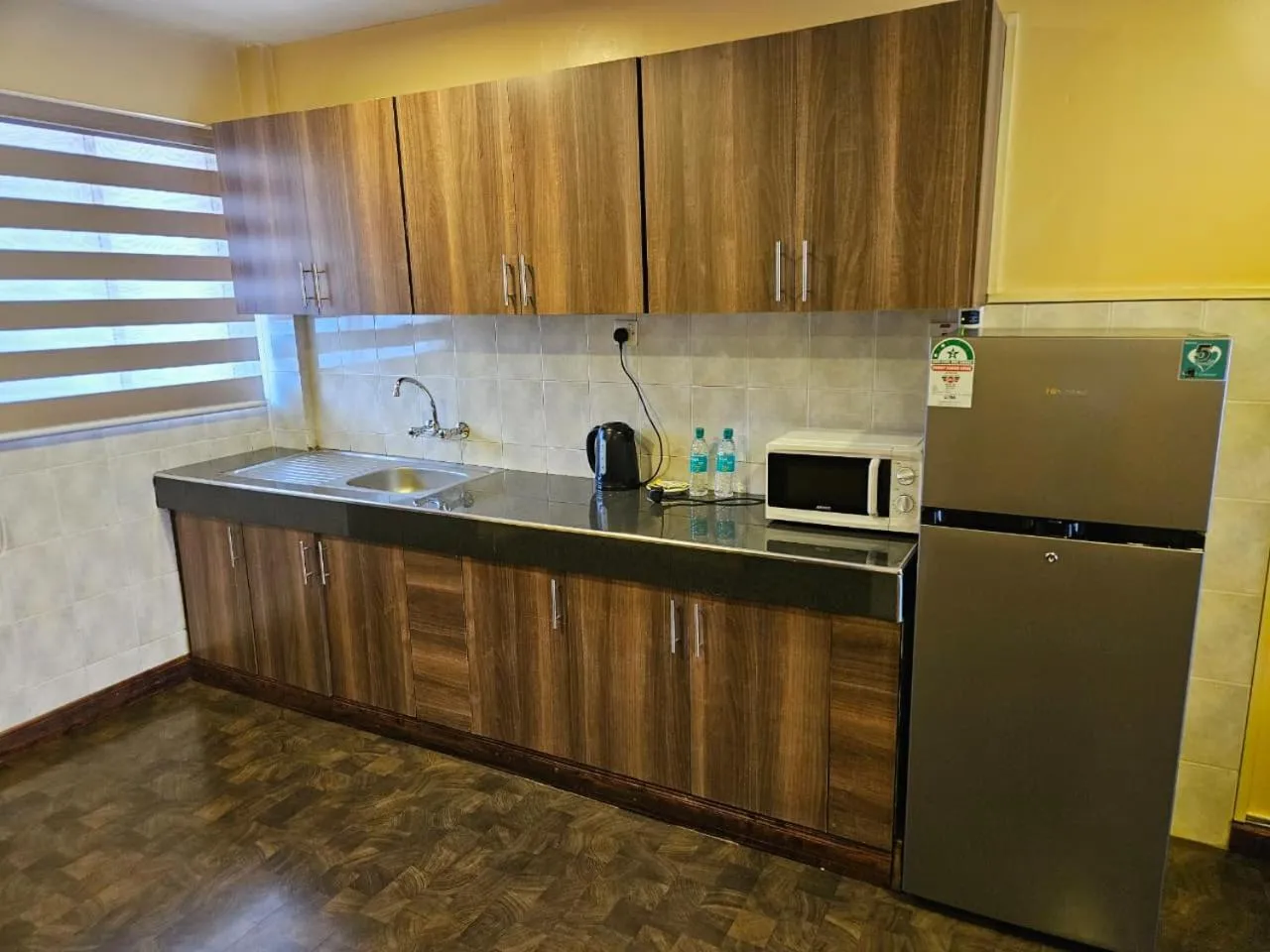 Kitchen or kitchenette in Progressive Park Hotel