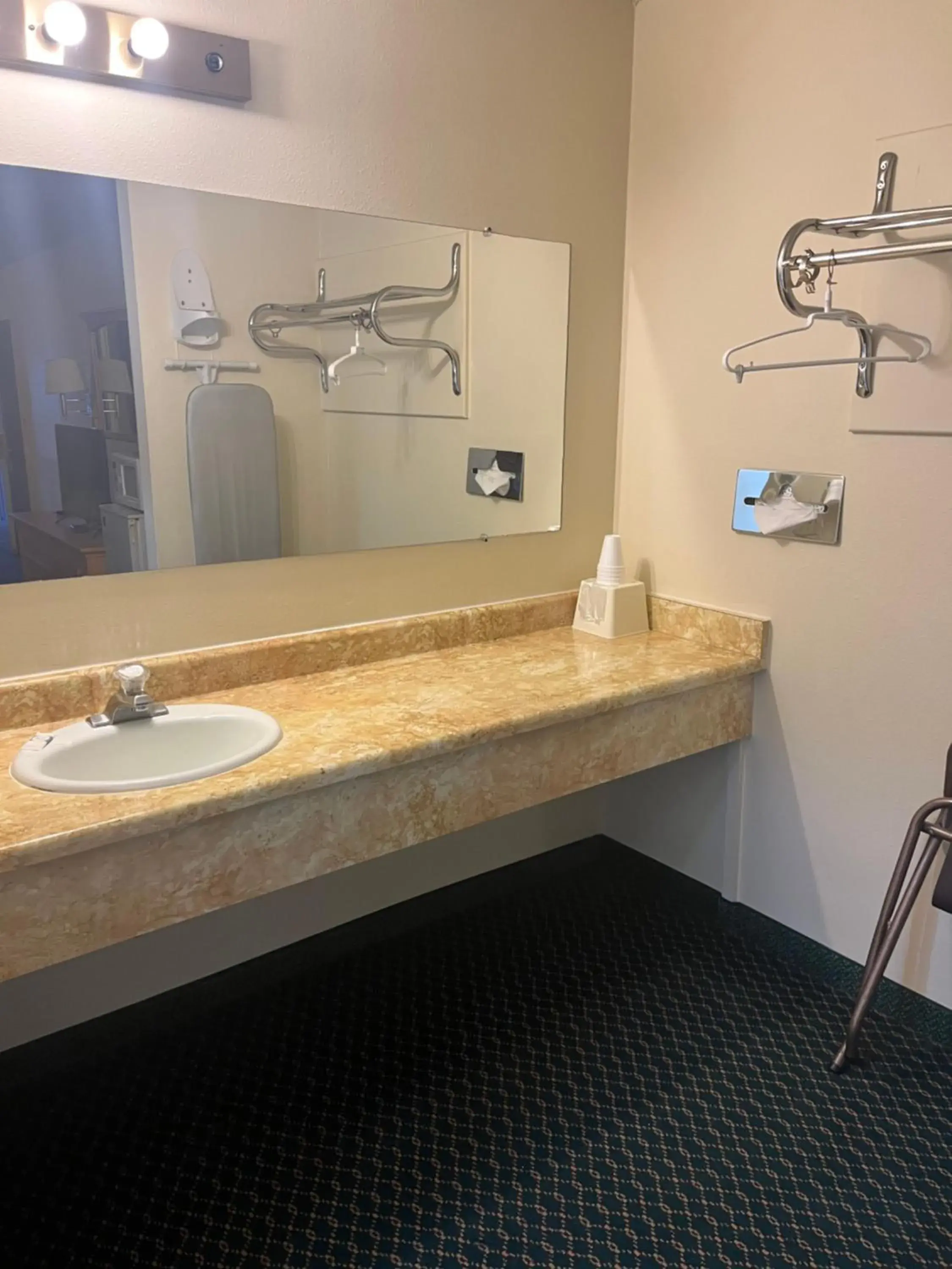 Bathroom in Western Inn Lakewood Bathroom in Western Inn Lakewood