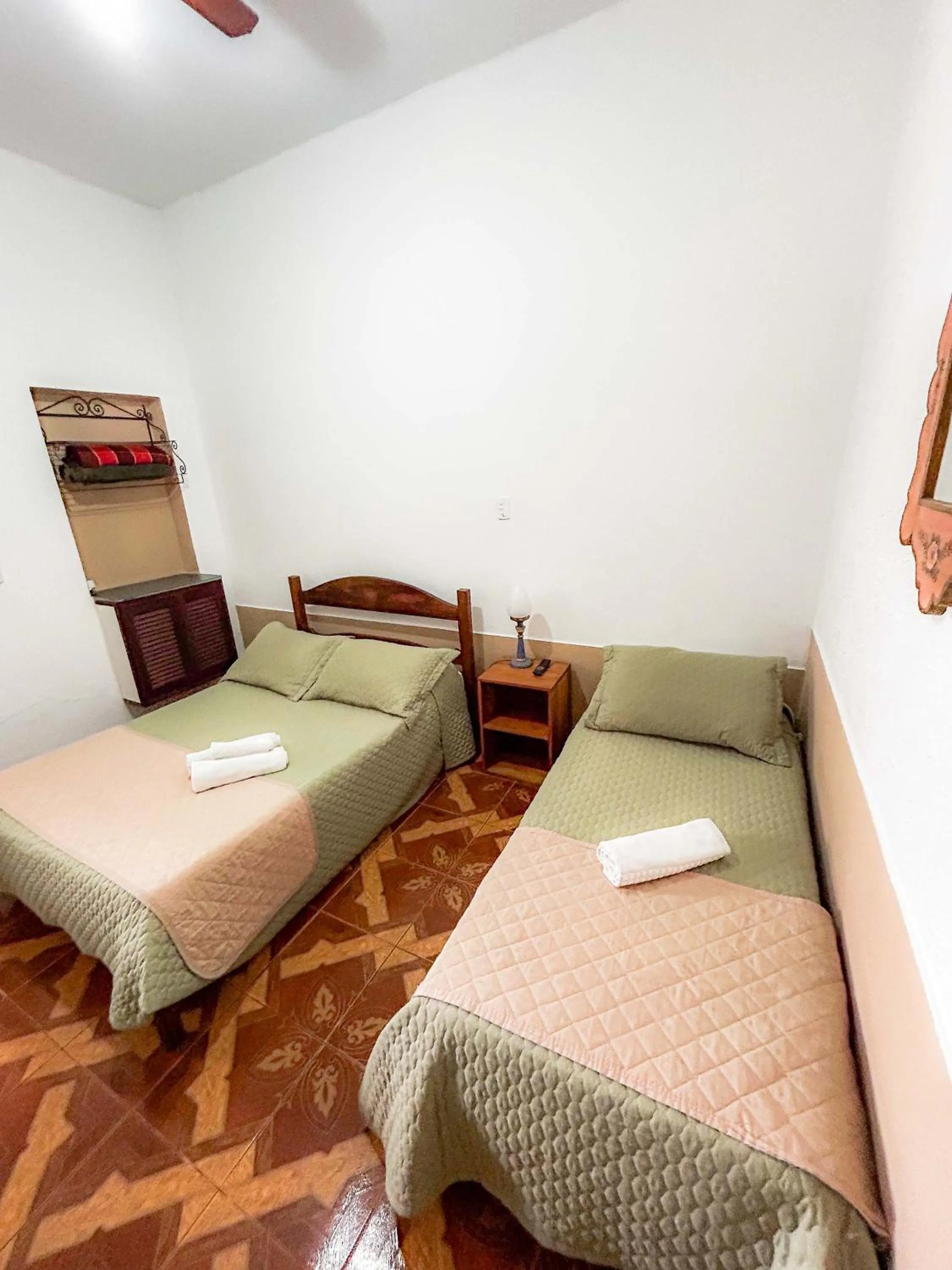 Bed in Pousada dos Sinos