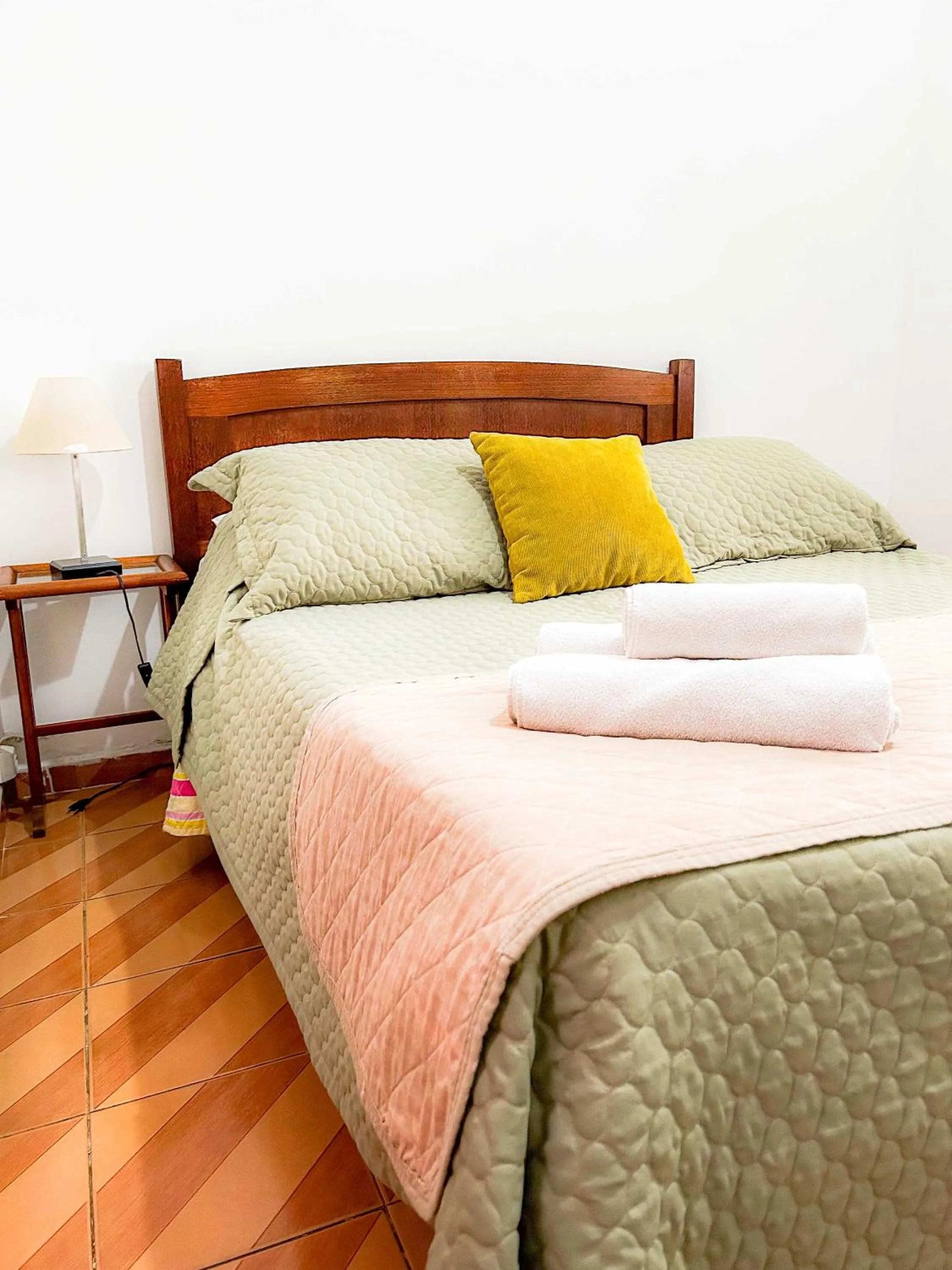 Bed in Pousada dos Sinos