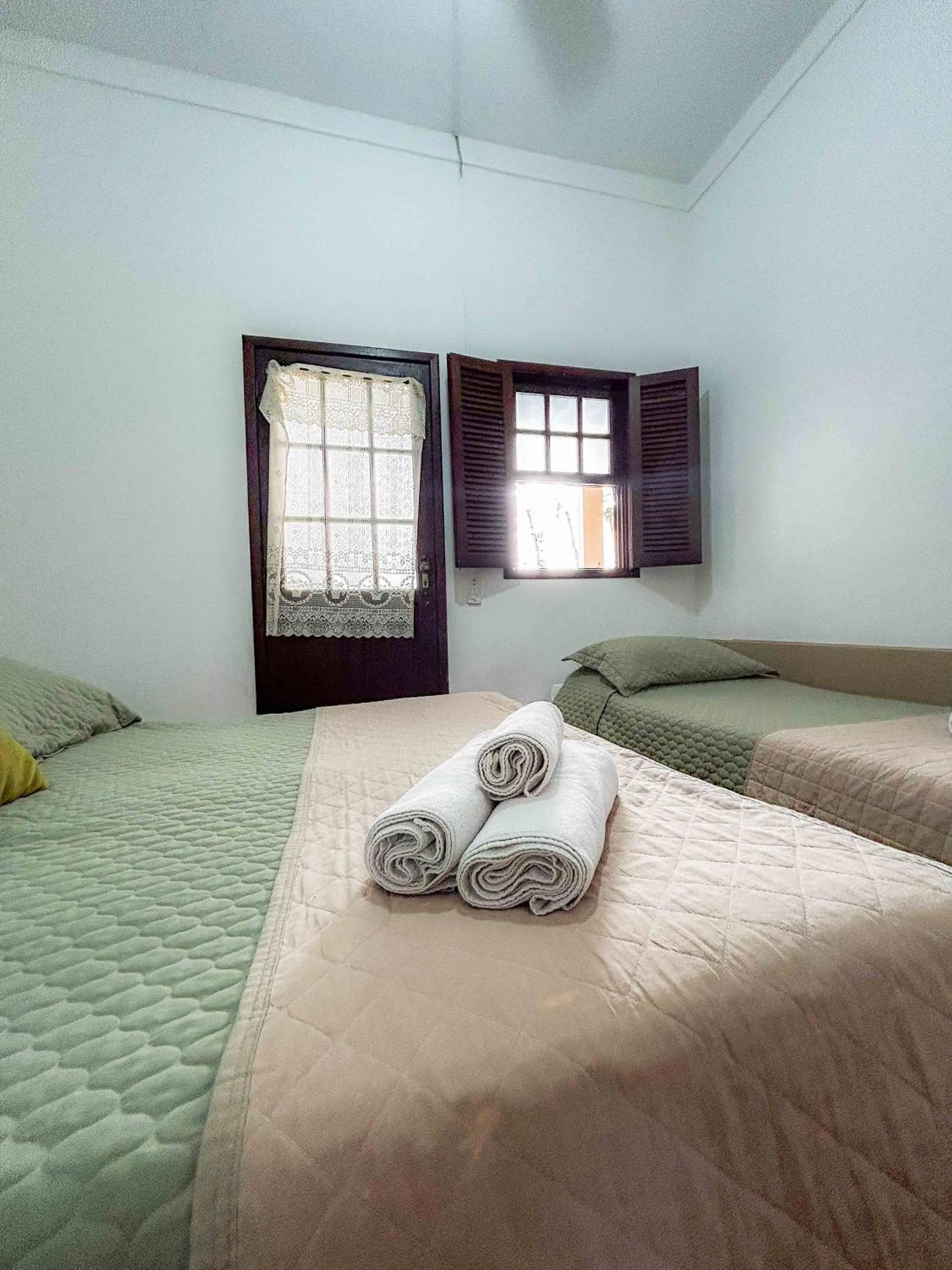 Bed in Pousada dos Sinos