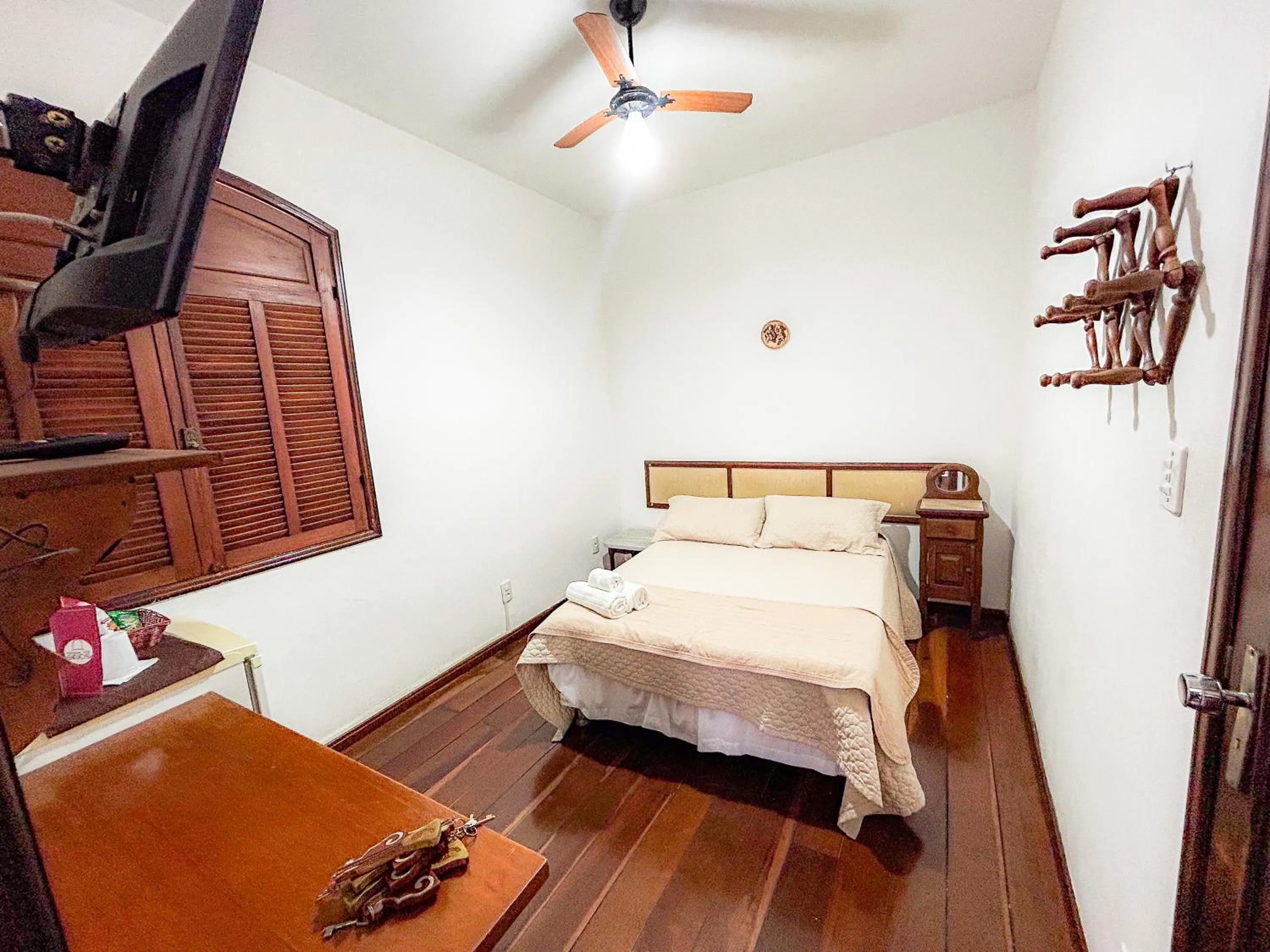 Bed in Pousada dos Sinos