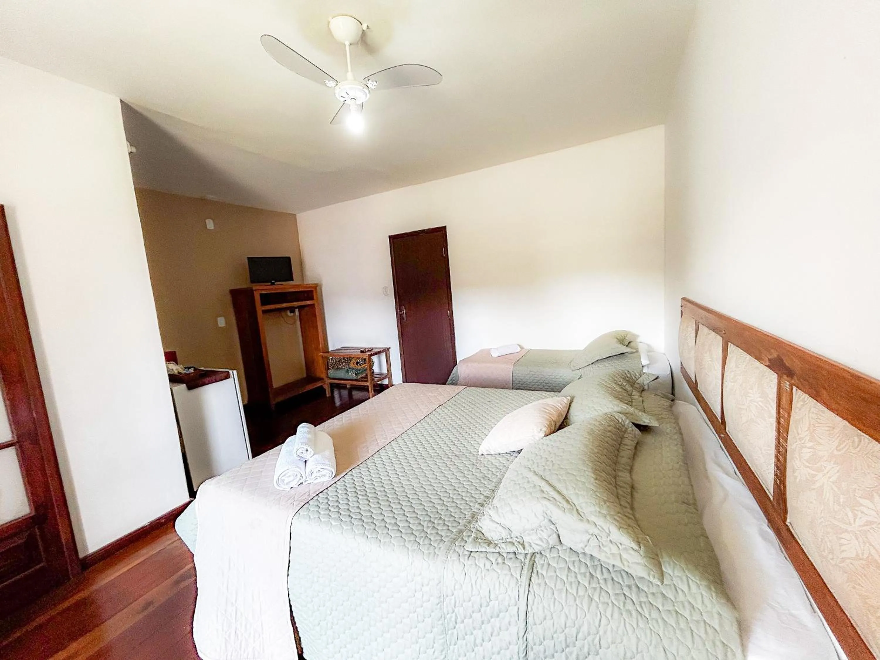 Bed in Pousada dos Sinos