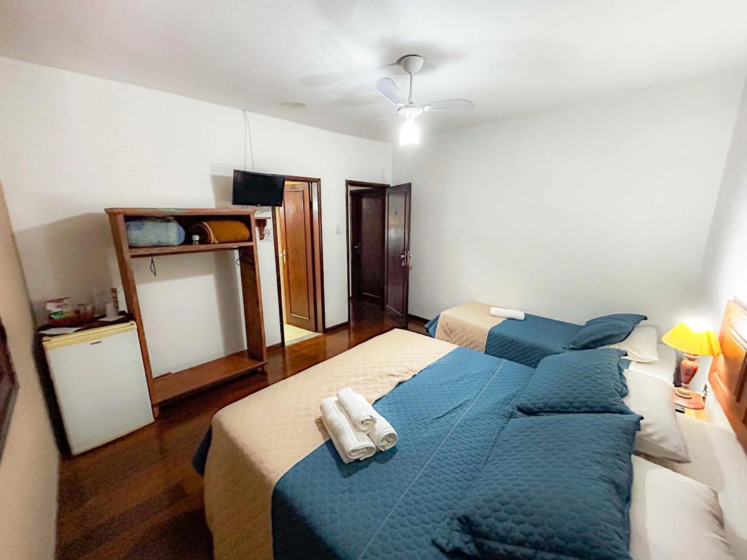 Bed in Pousada dos Sinos