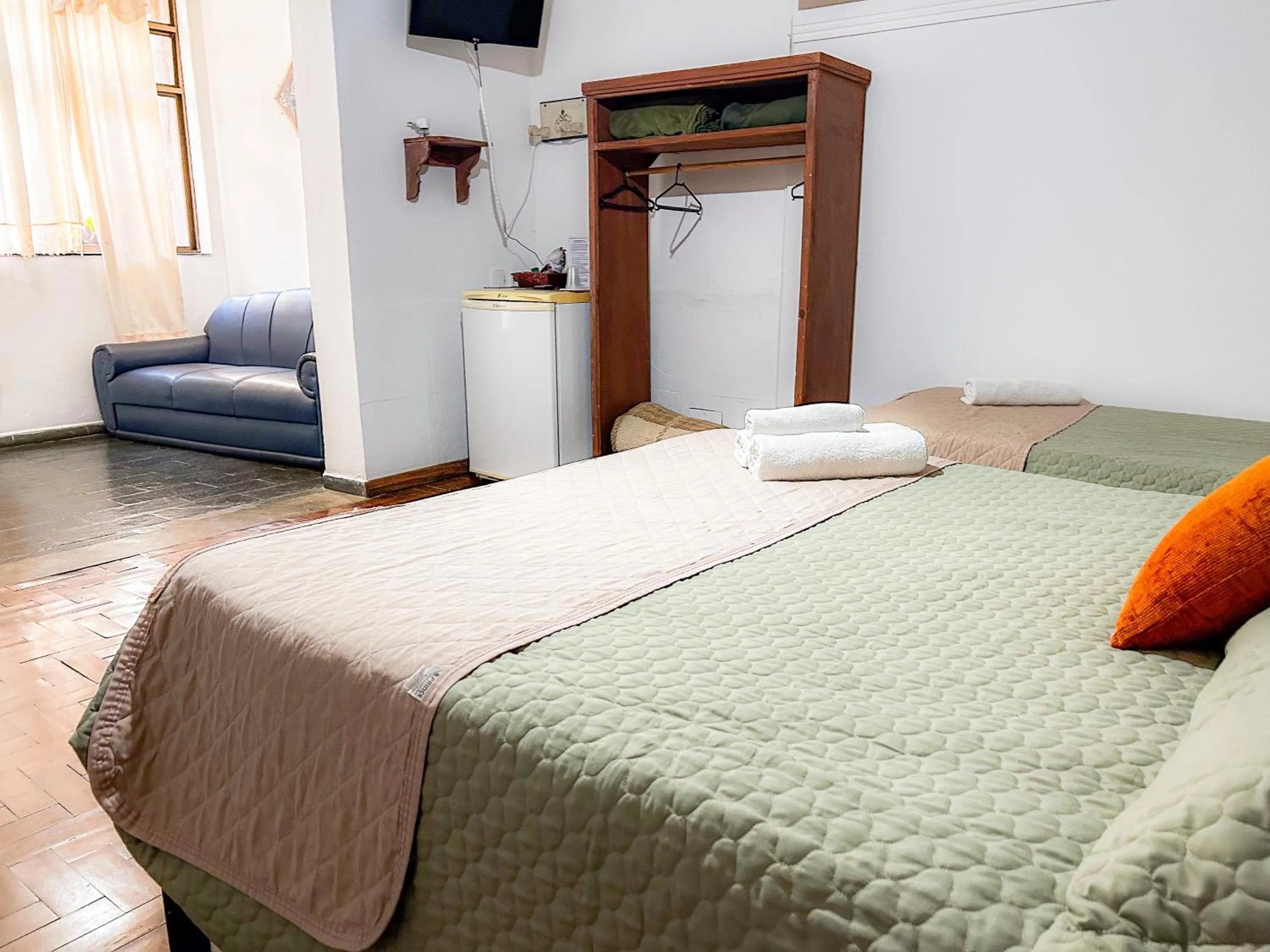 Bed in Pousada dos Sinos