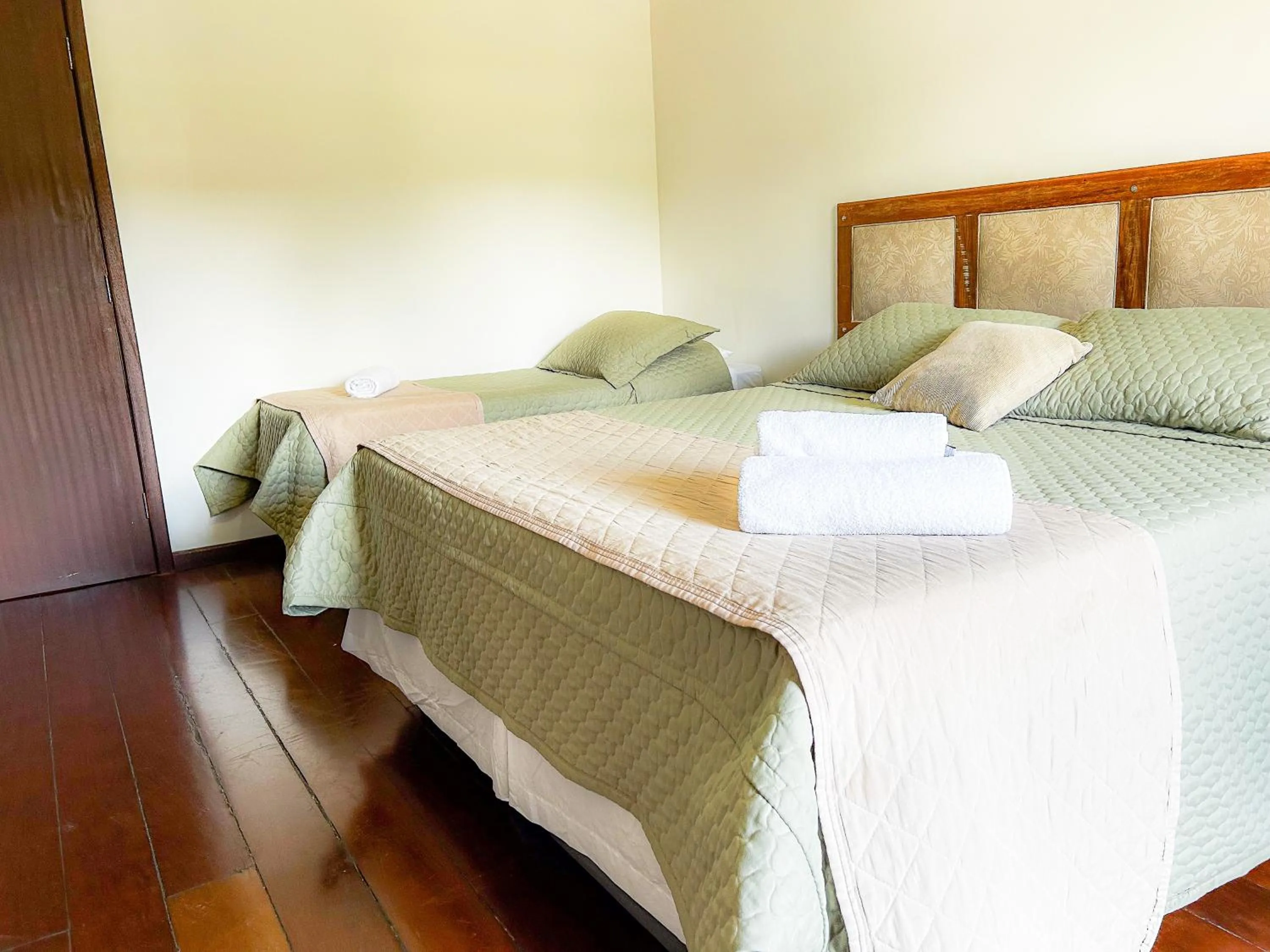 Bed in Pousada dos Sinos