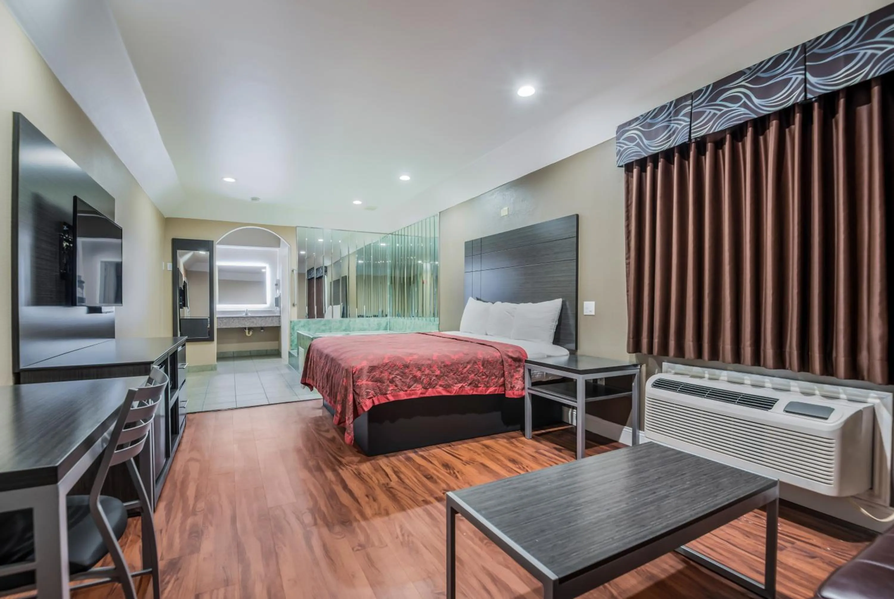 Bed in Scottish Inns & Suites IAH Airport-Beltway 8