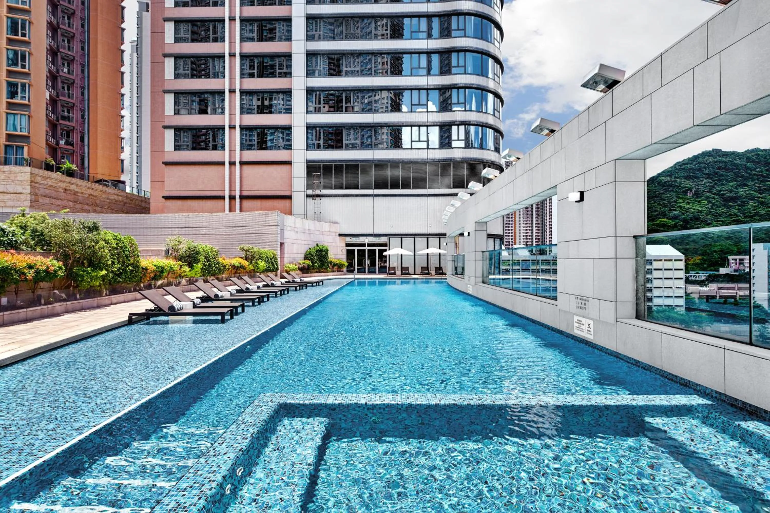 Swimming pool in Crowne Plaza Hong Kong Kowloon East by IHG