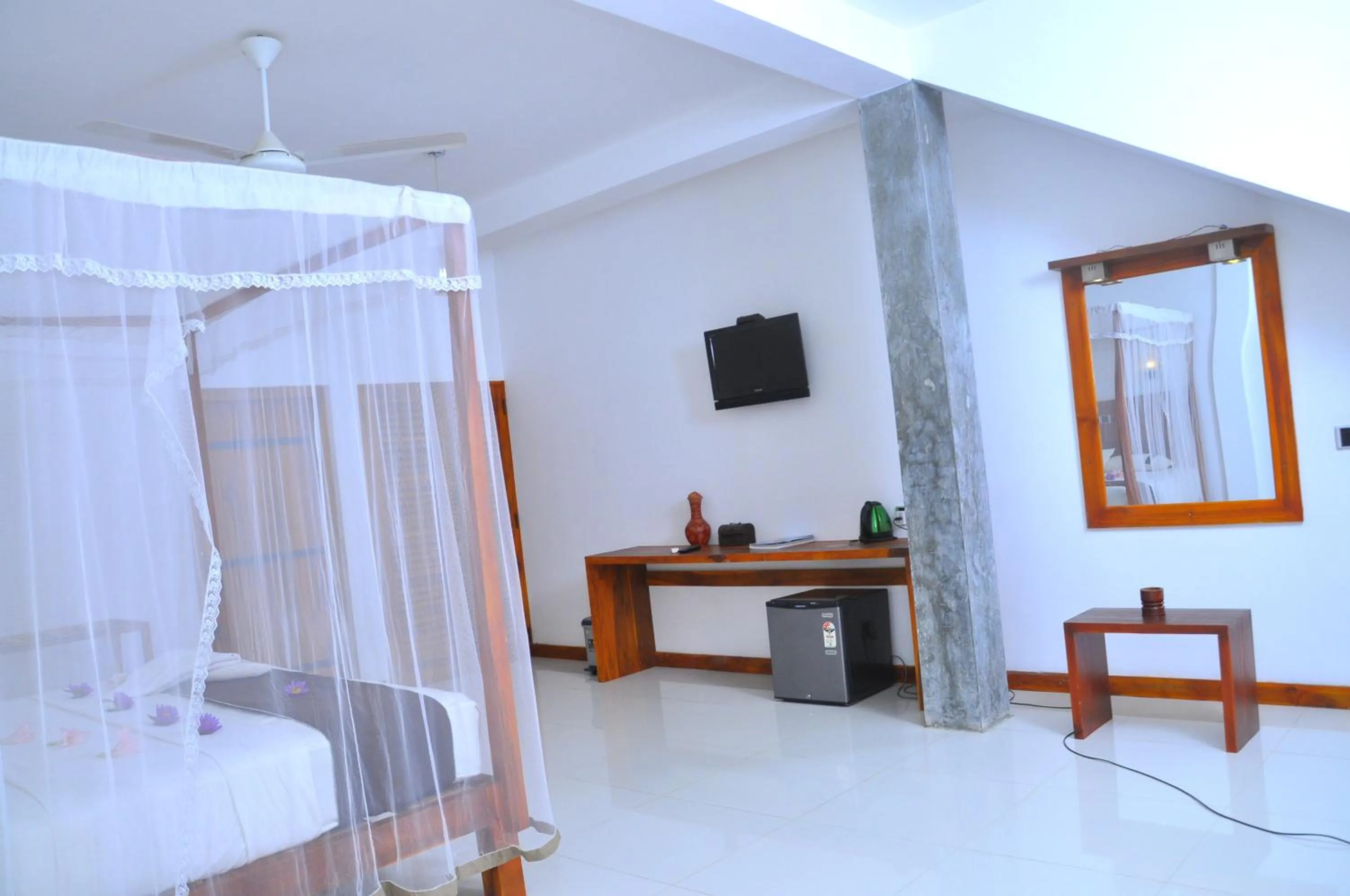 Photo of the whole room, Bed in Kottawatta Village