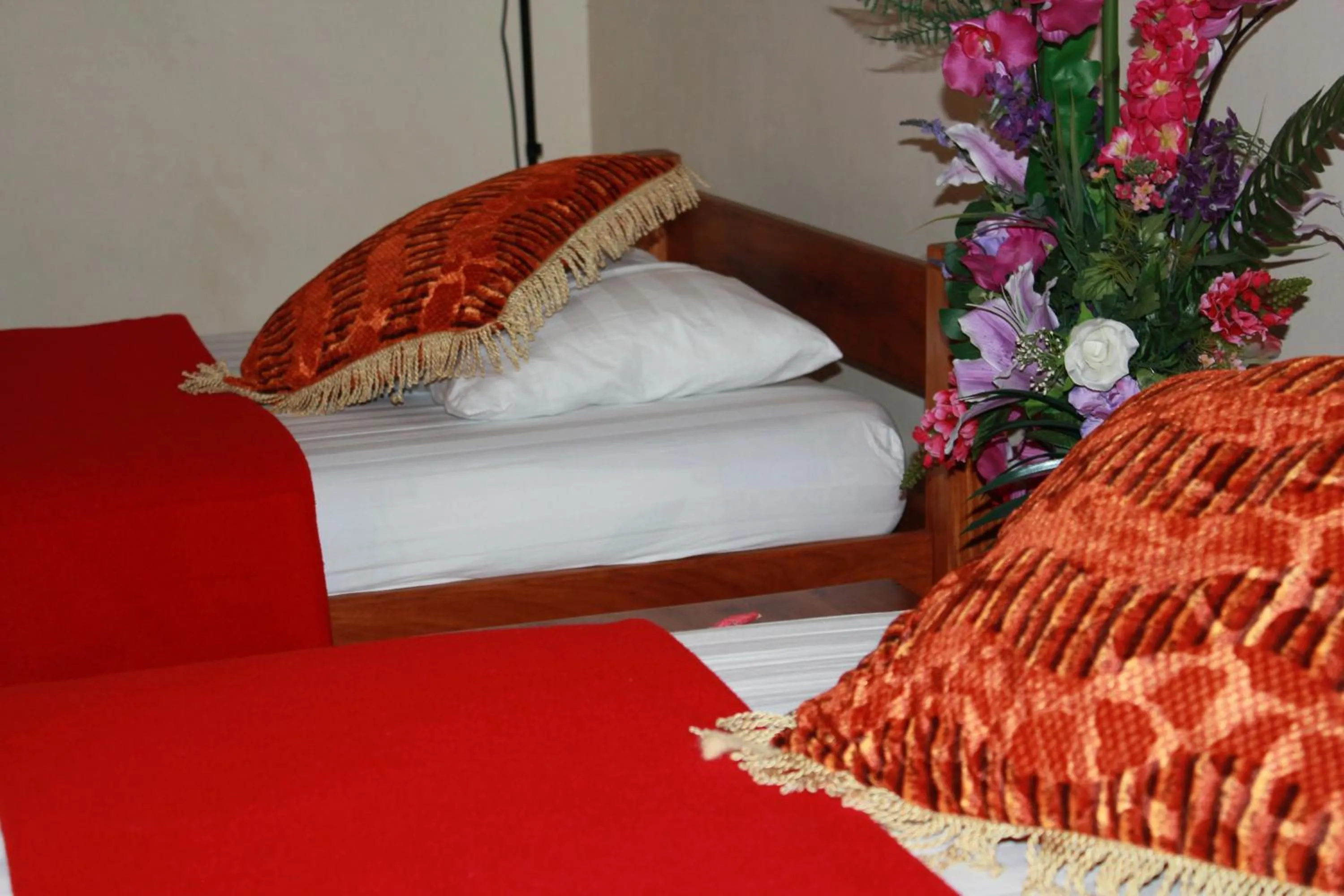 Bed in Pacific Paradise Motel