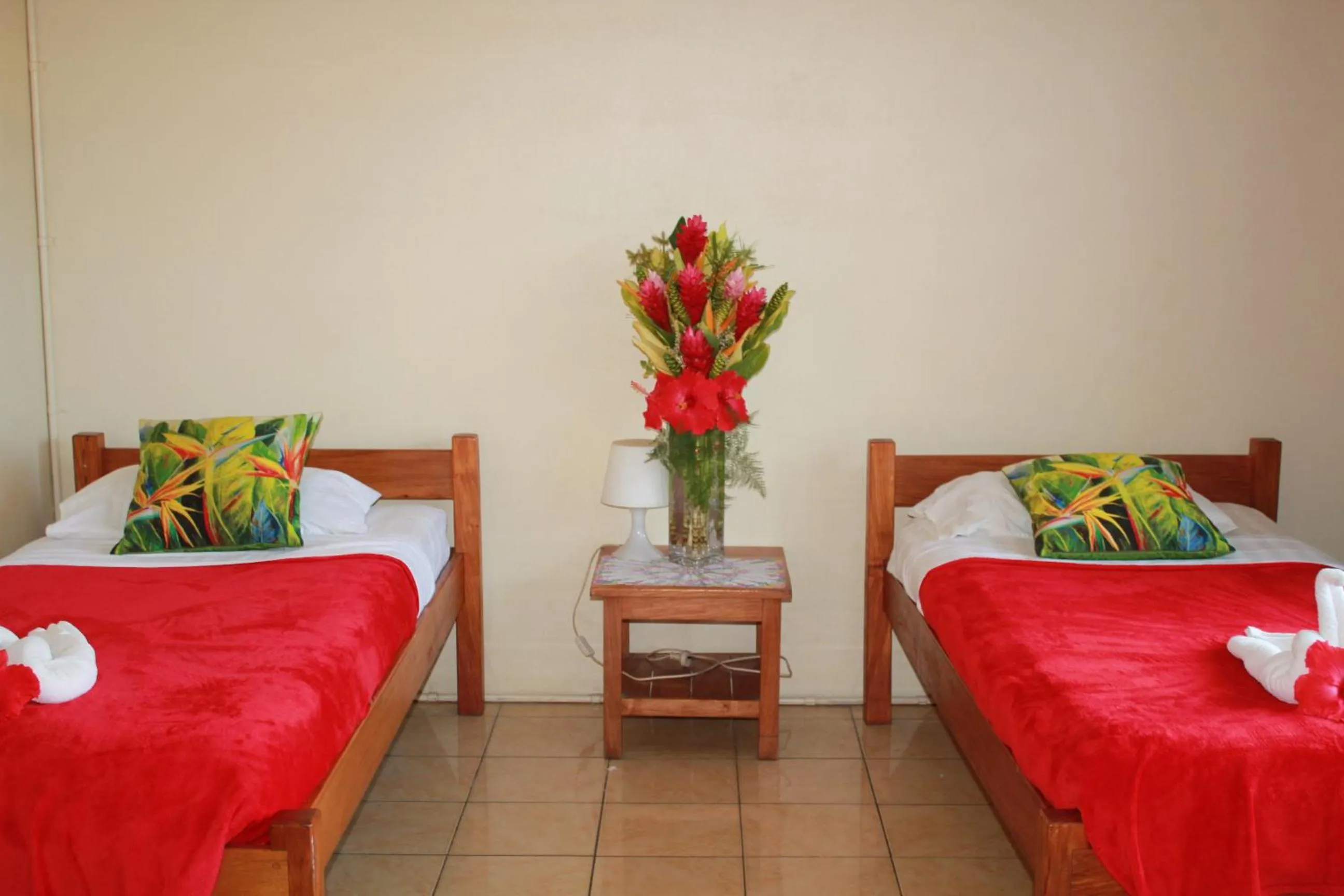 Bed in Pacific Paradise Motel