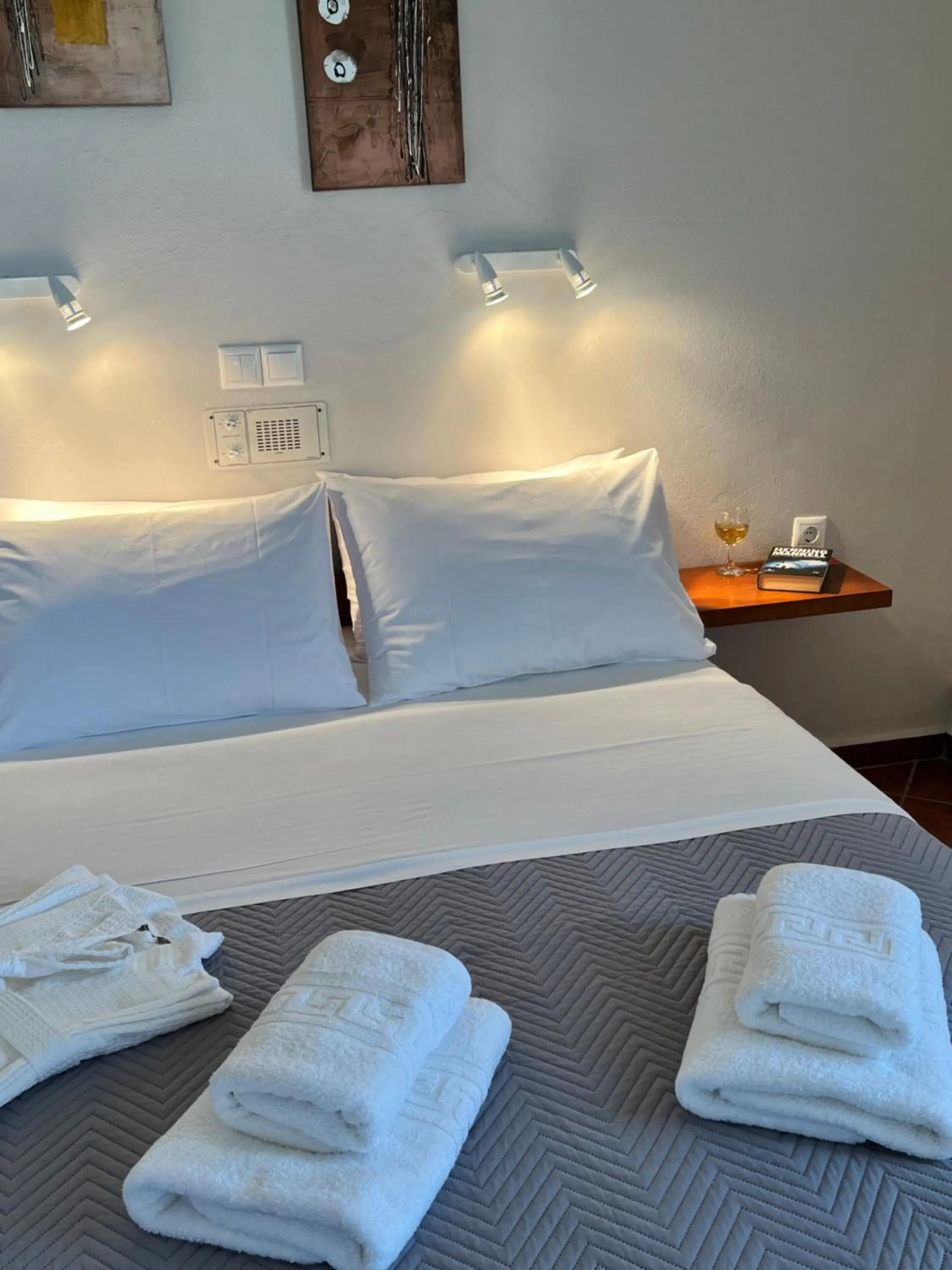 Bed in Iolkos Hotel Apartments