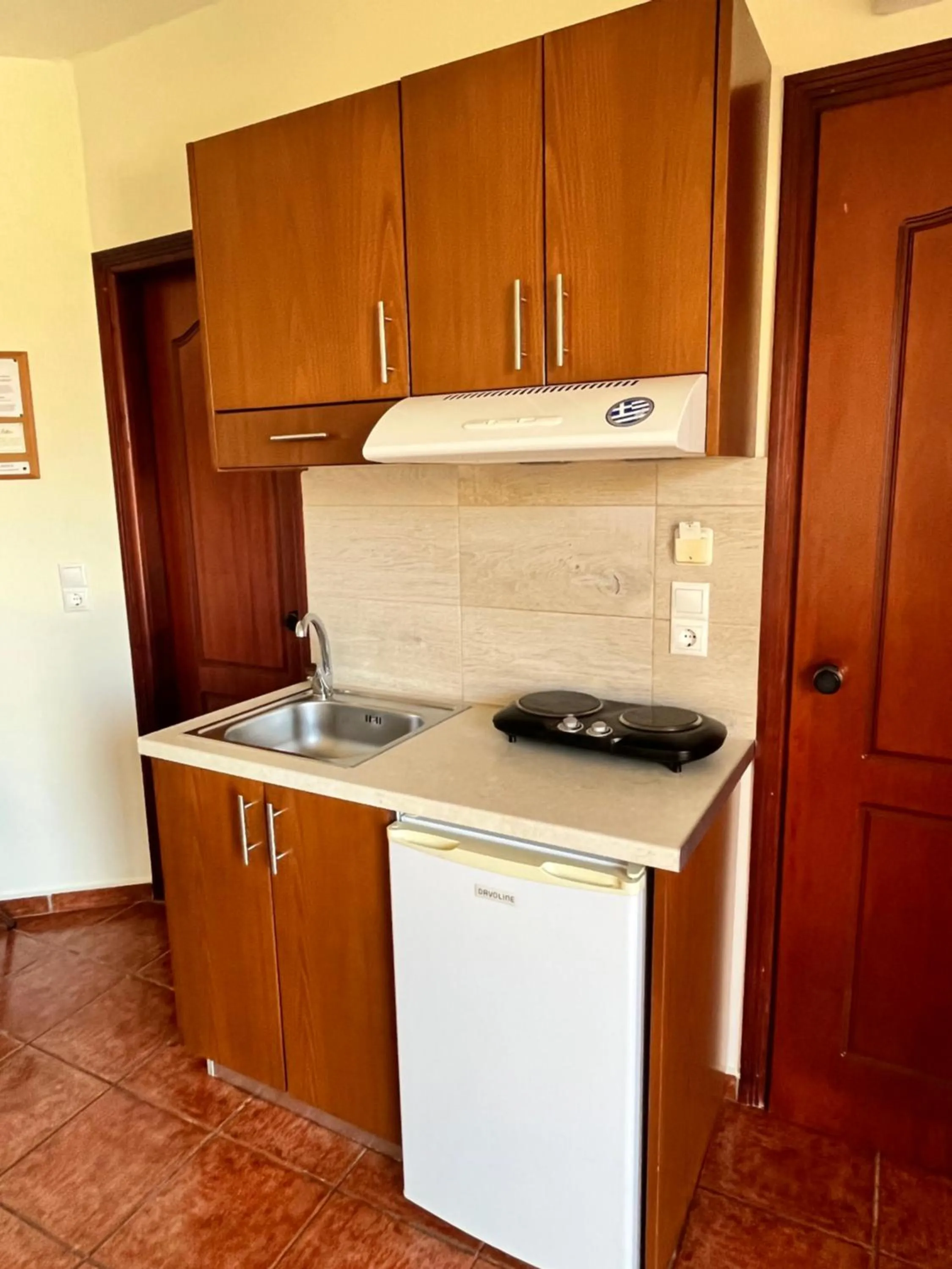 kitchen in Iolkos Hotel Apartments