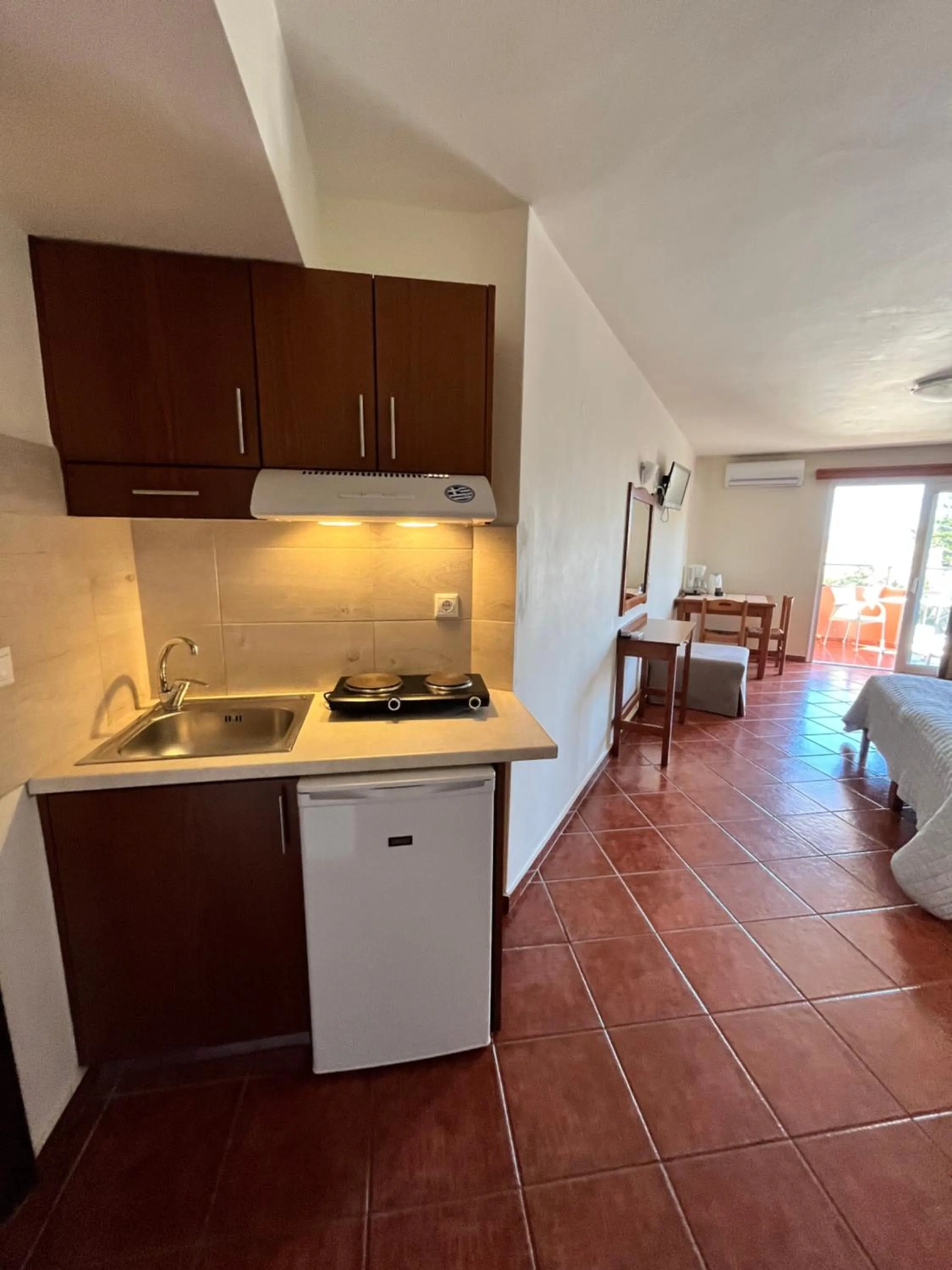 Kitchen or kitchenette in Iolkos Hotel Apartments