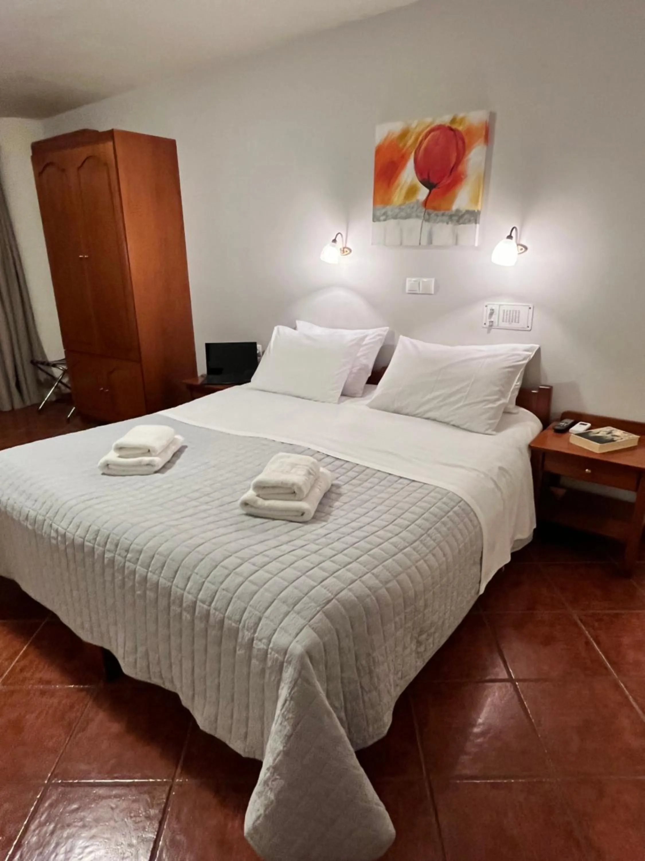 Bed in Iolkos Hotel Apartments