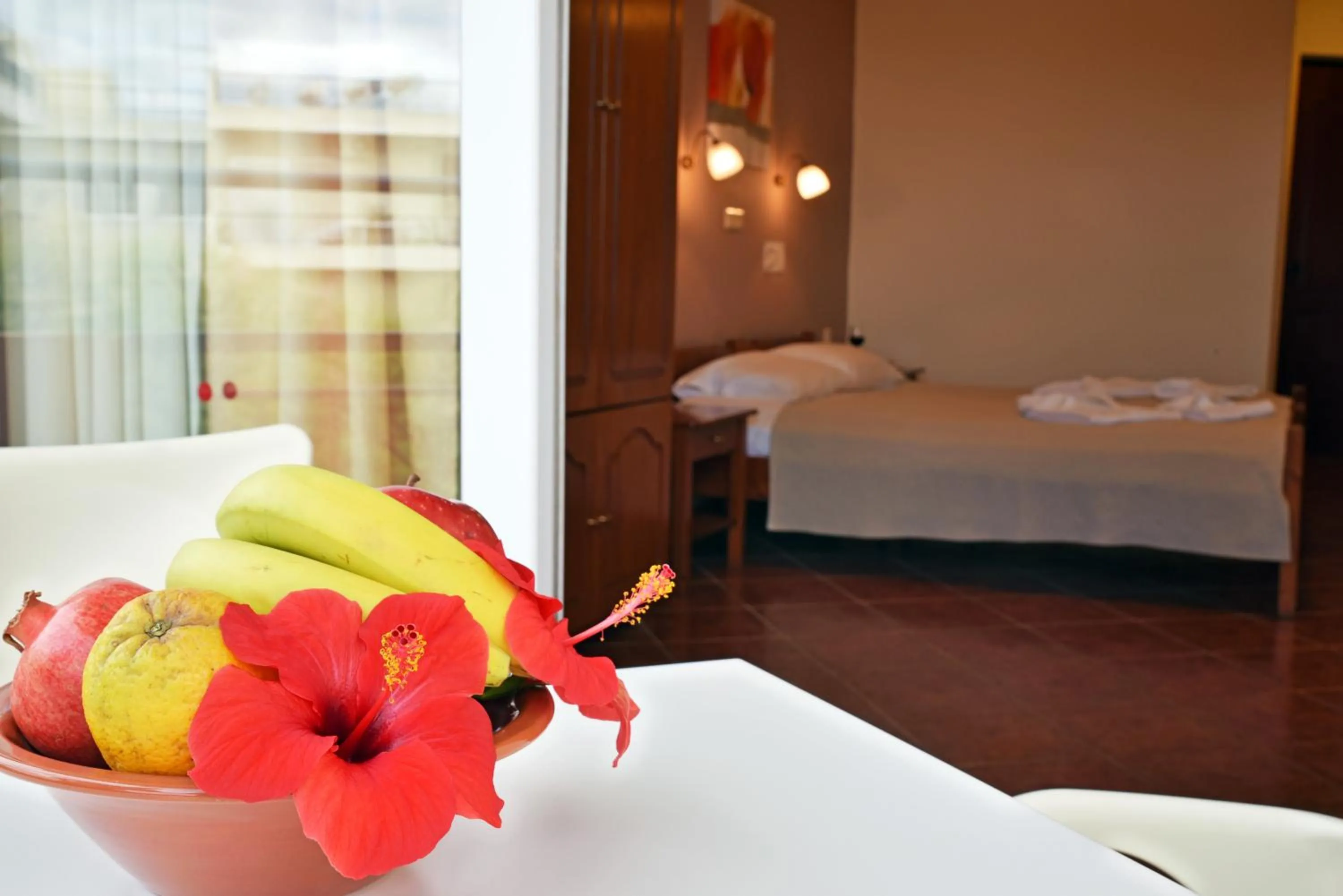 Bed in Iolkos Hotel Apartments