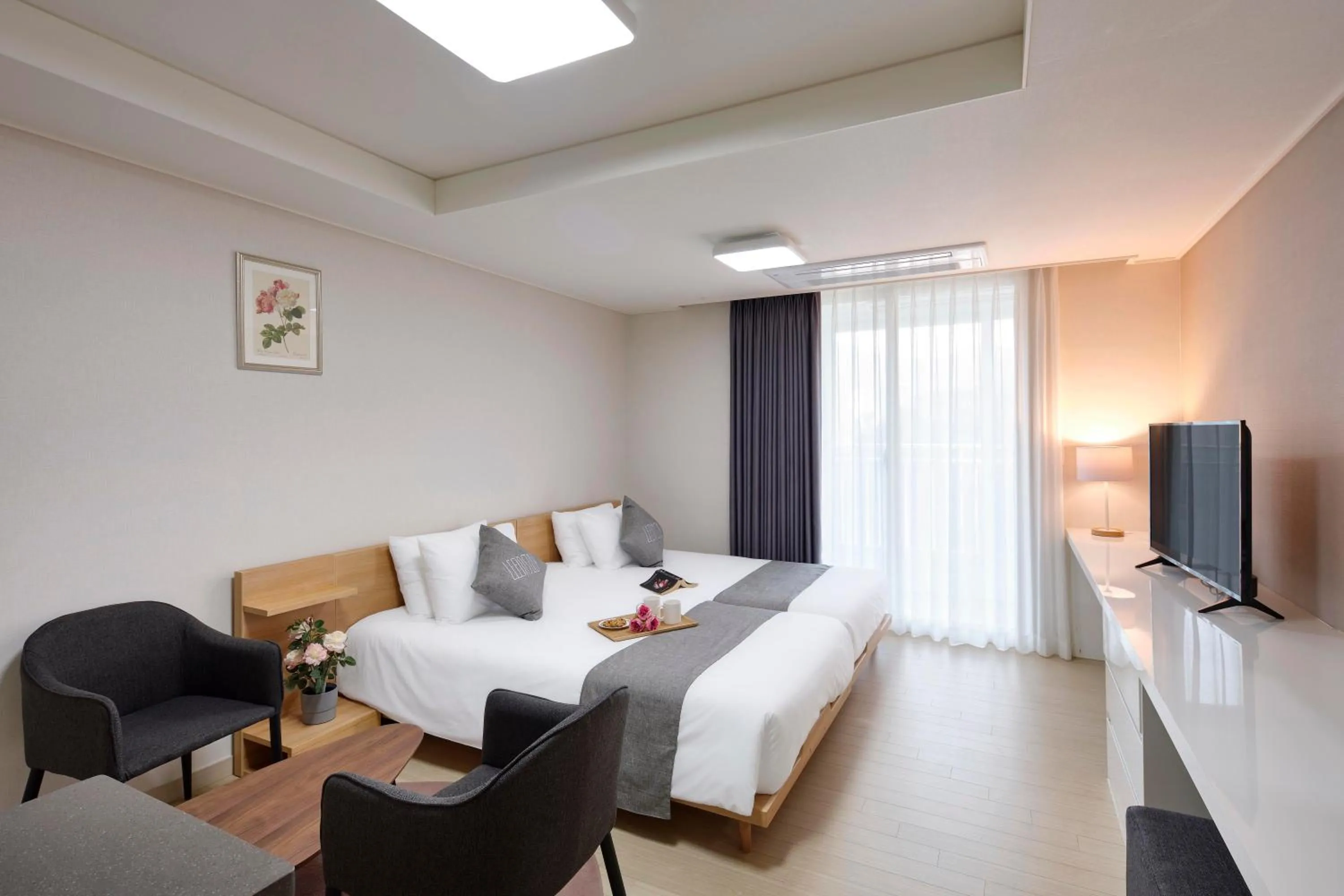 Bed in Geoje Leein Stay Hotel