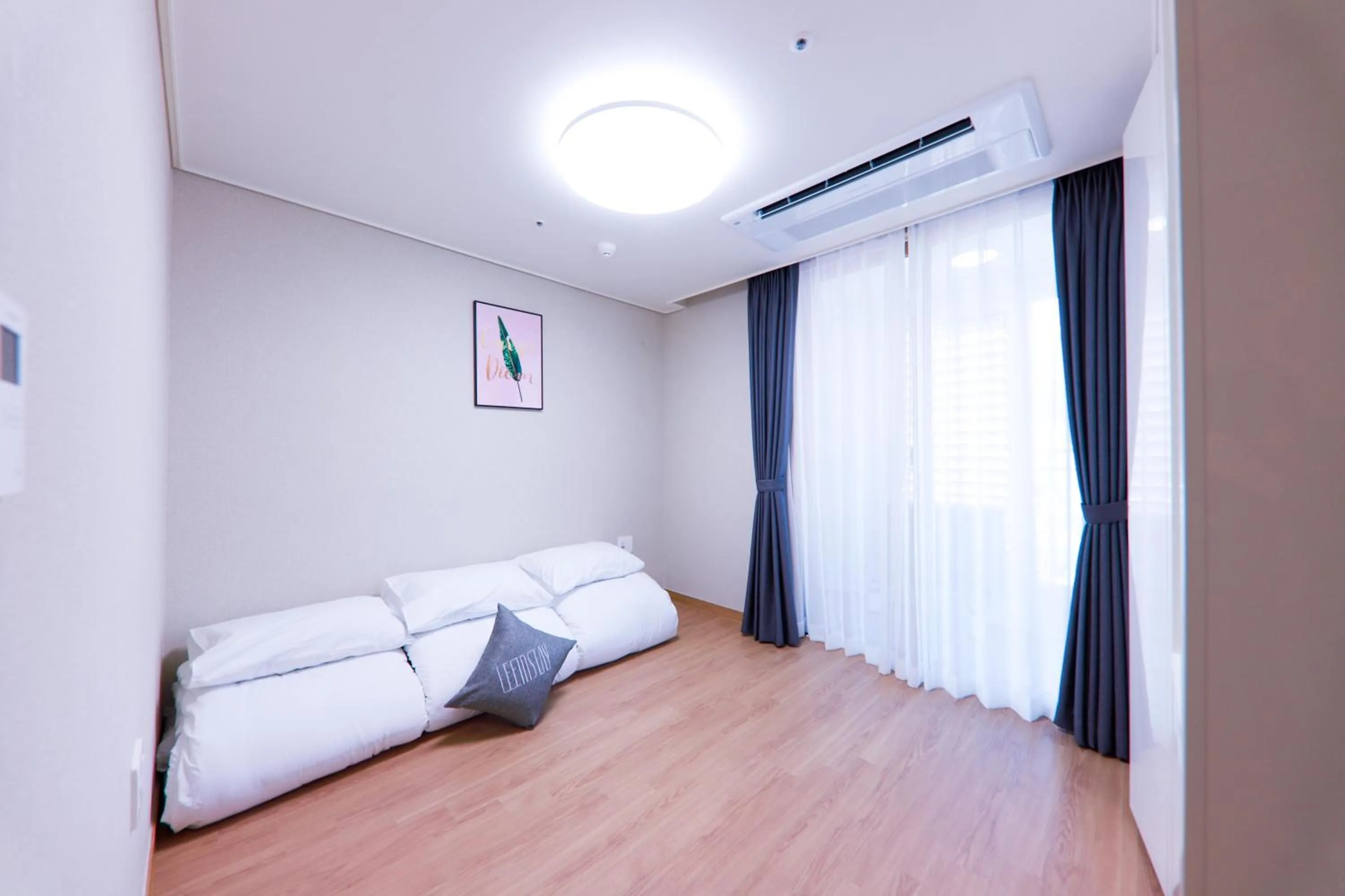 Bed in Geoje Leein Stay Hotel