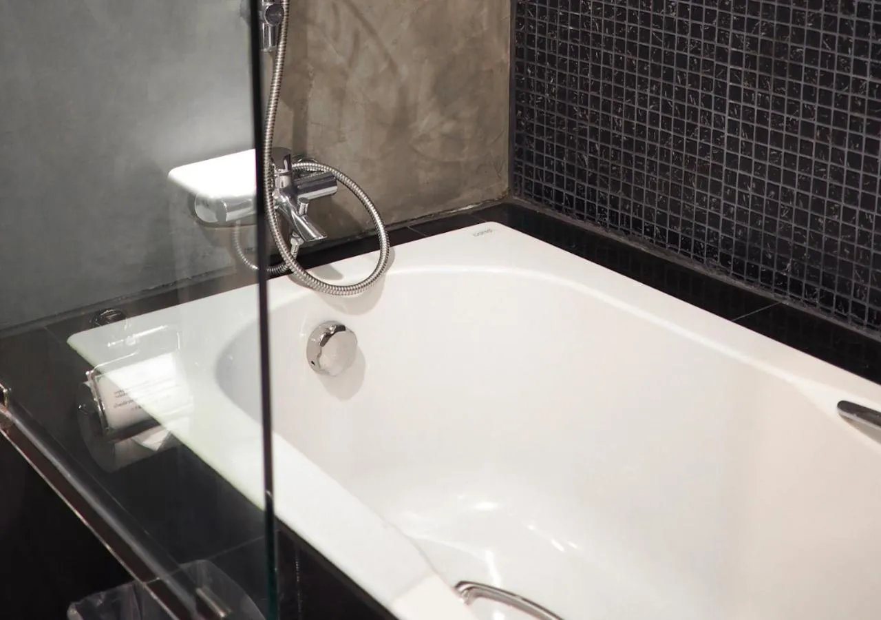 Bathroom in NAI YA Hotel -SHA Extra Plus