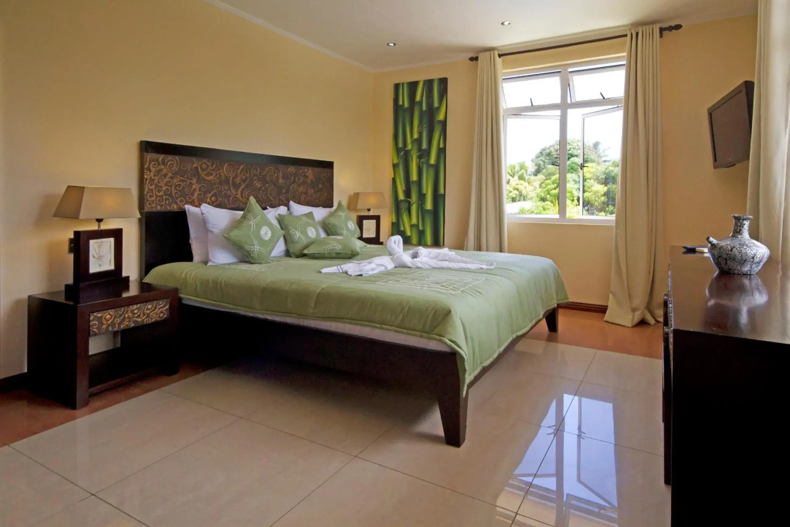 Bed in The Palm Seychelles Bed in The Palm Seychelles